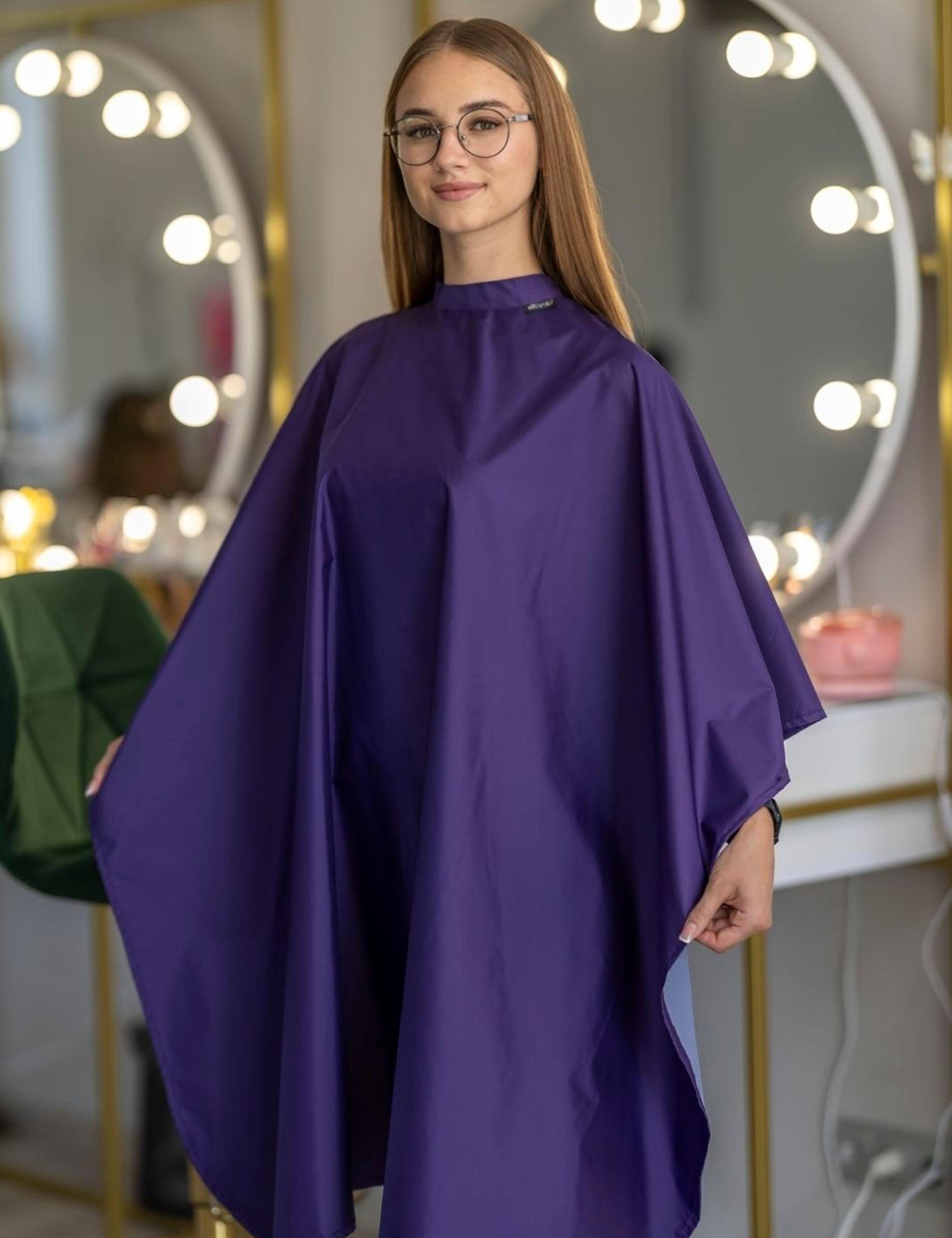Full-coverage purple color cape ensuring ultimate client protection and comfort.