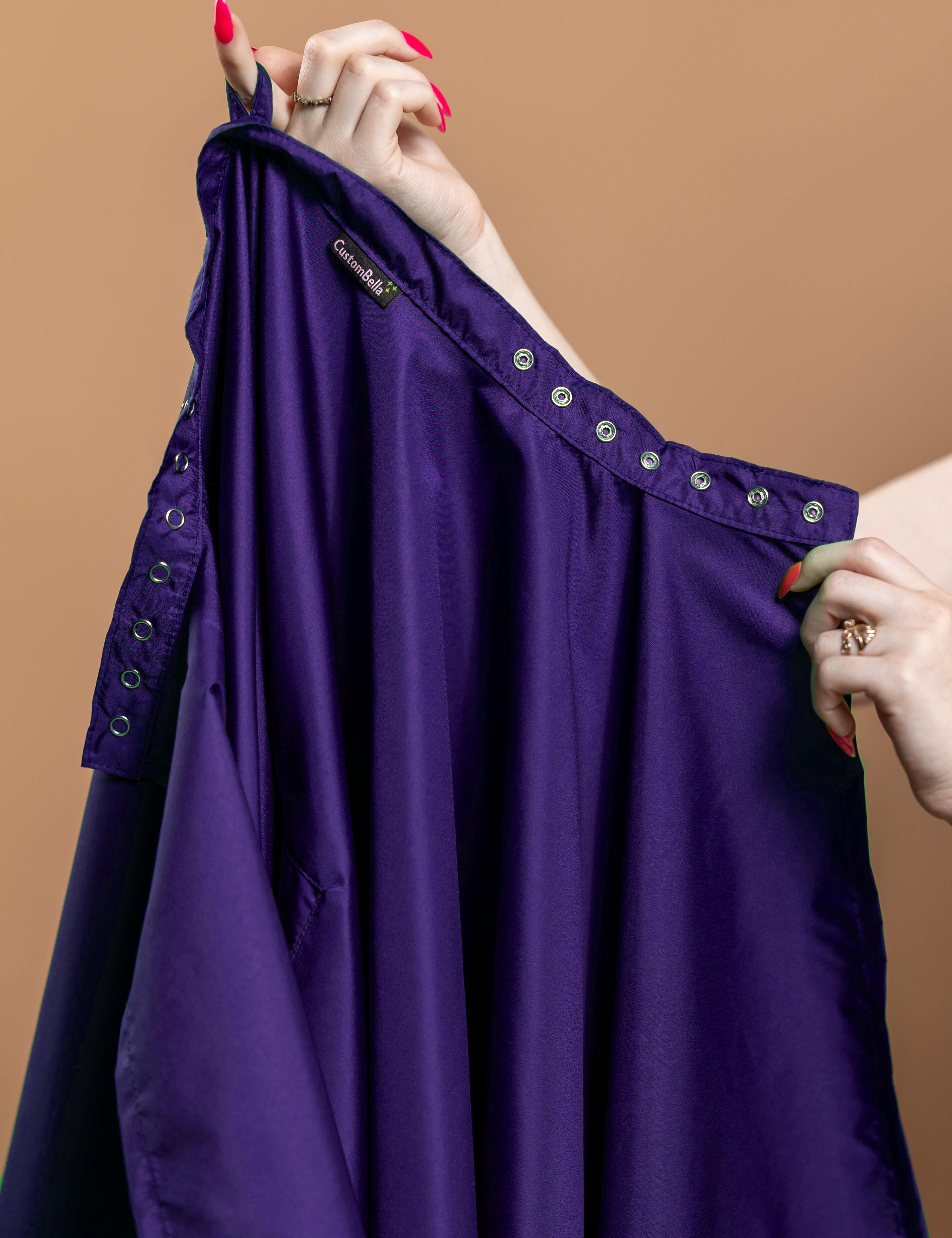 Purple salon cape with hand slits and adjustable snap closure