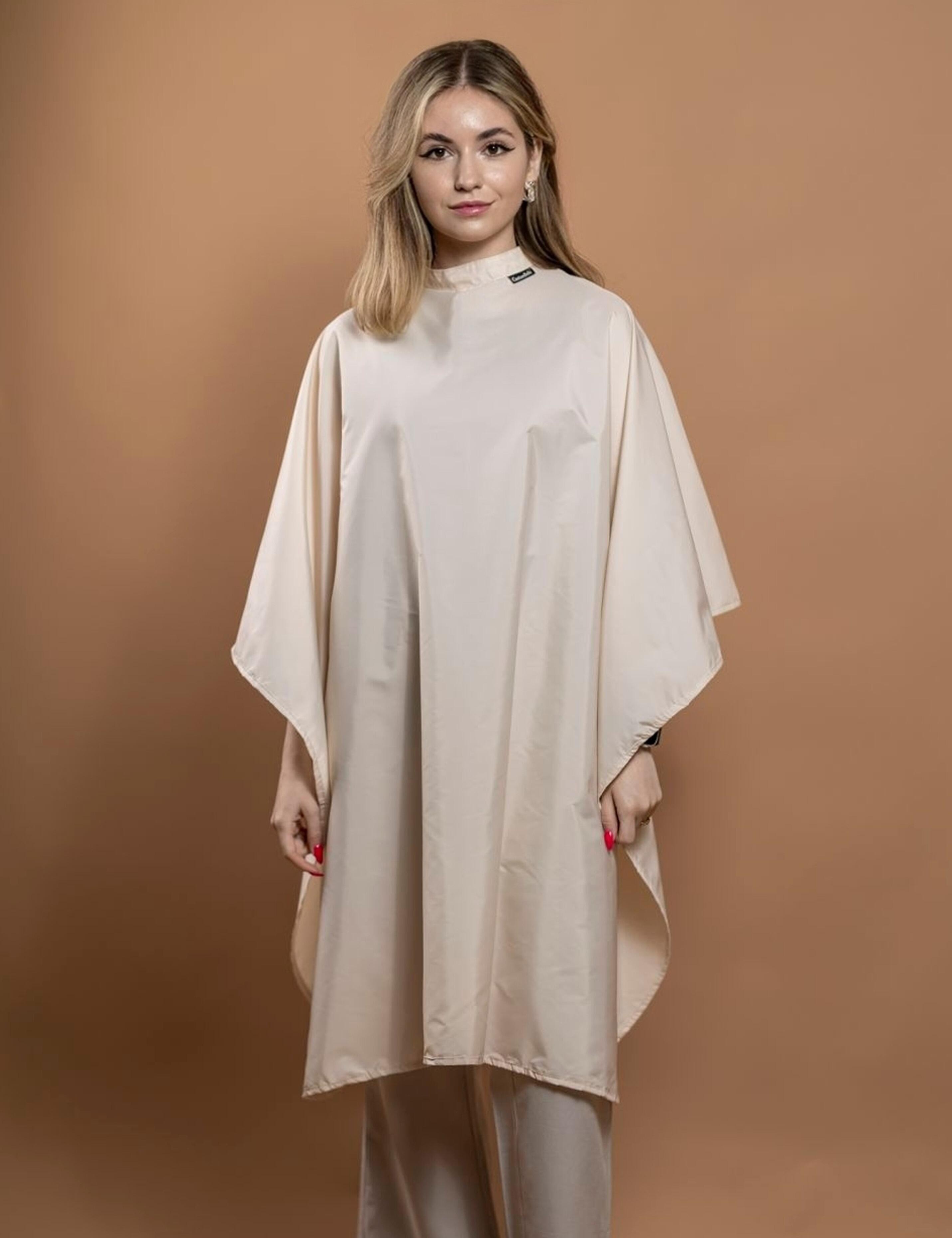 Water-resistant cream hair cape available for fast shipping across the USA.