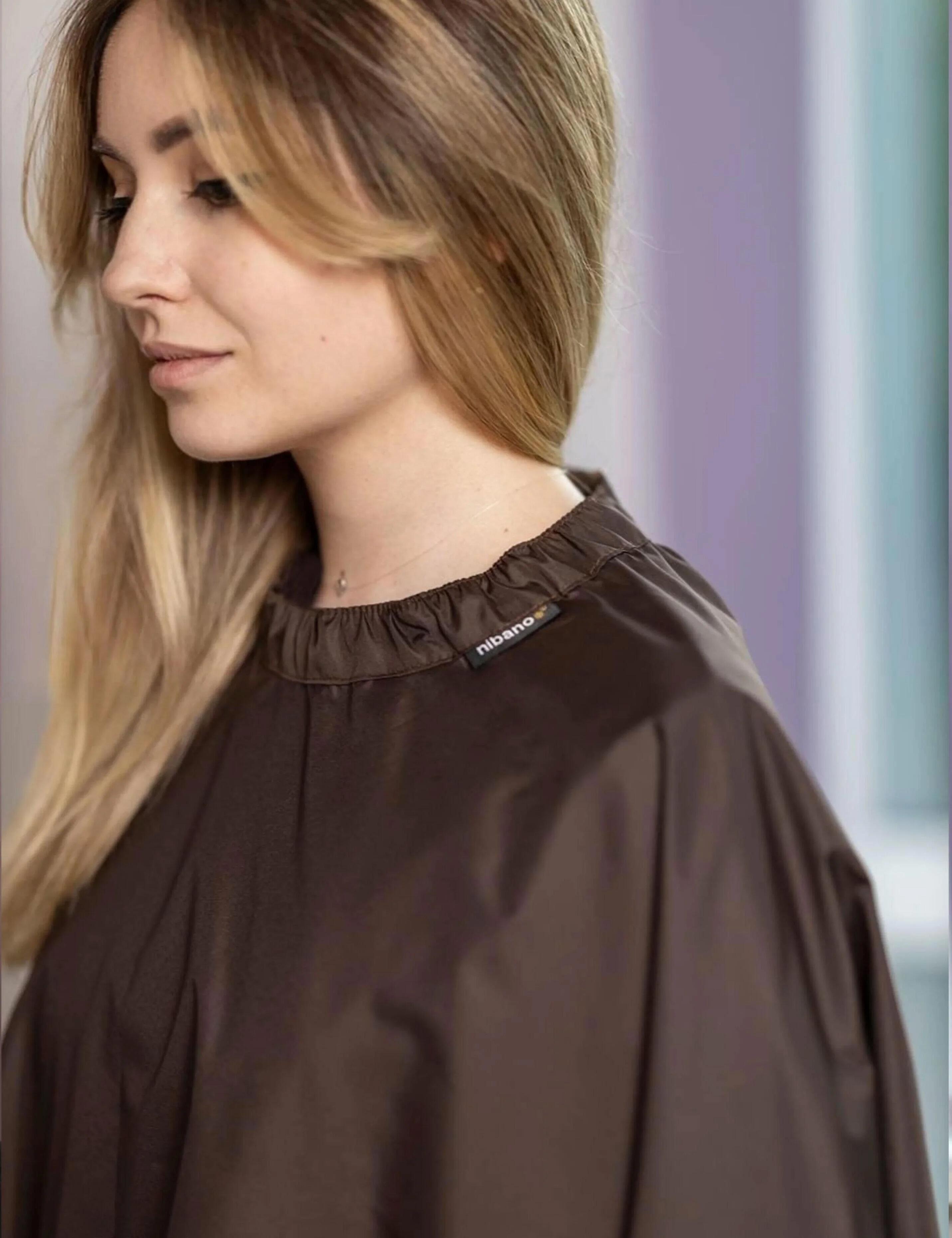 Aesthetic chocolate cape for professional hairdressing and styling services