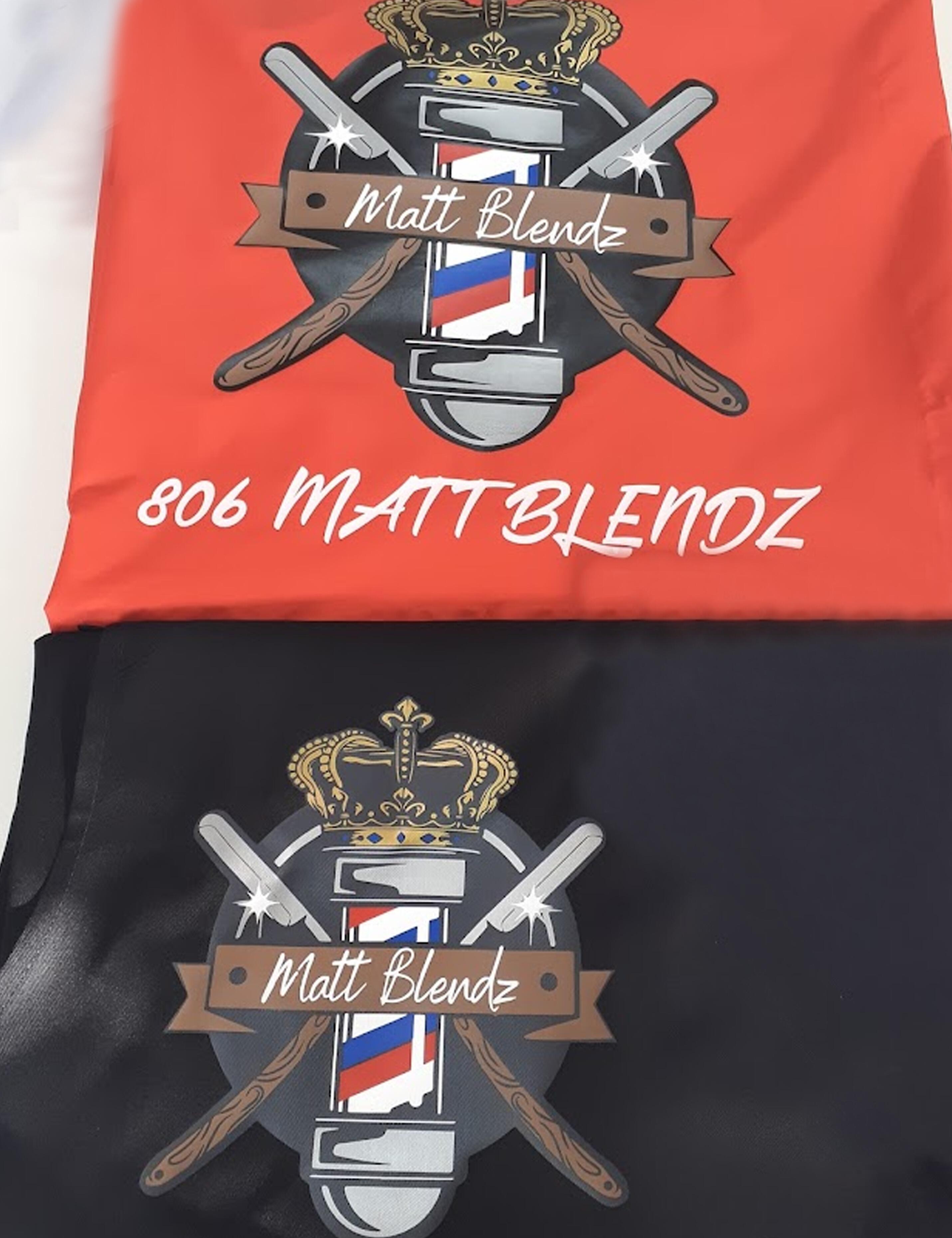 Custom printed red salon cape with a personalized hairdresser logo.
