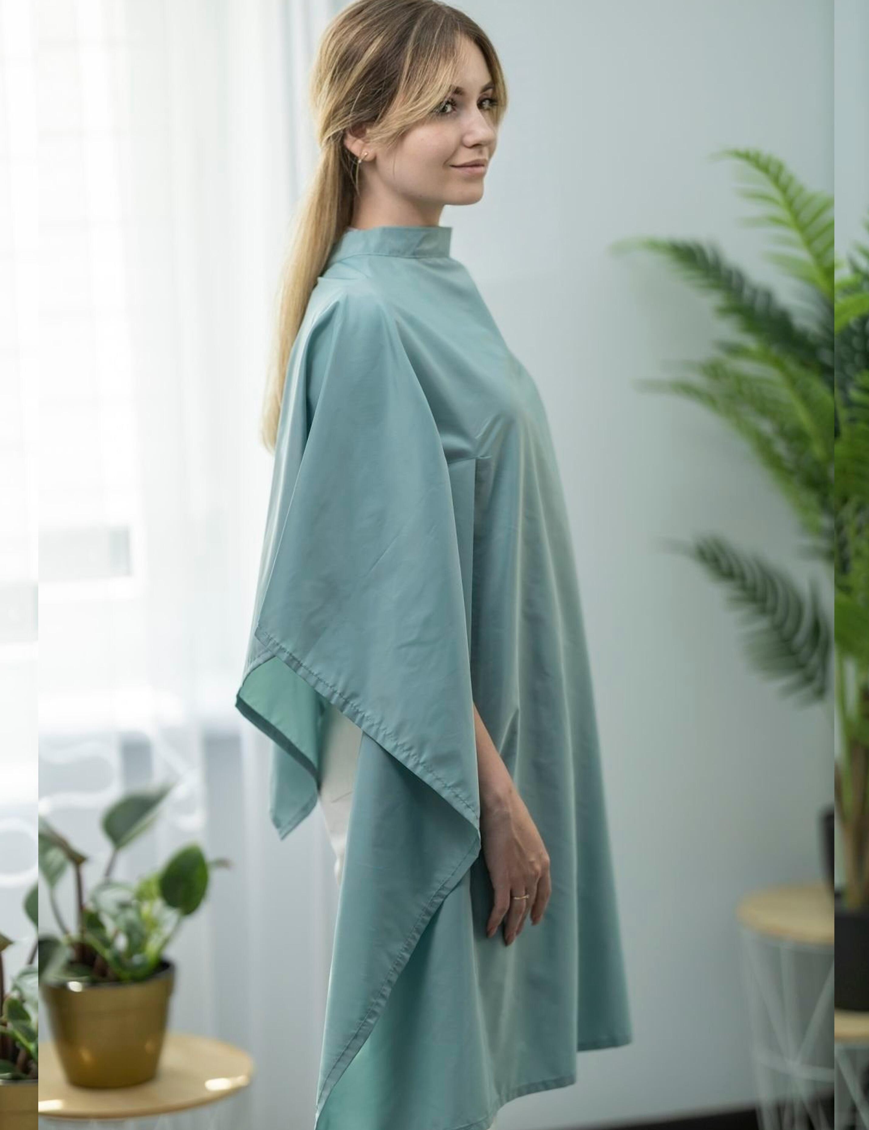 Stylish sage salon gown with slits for client hands