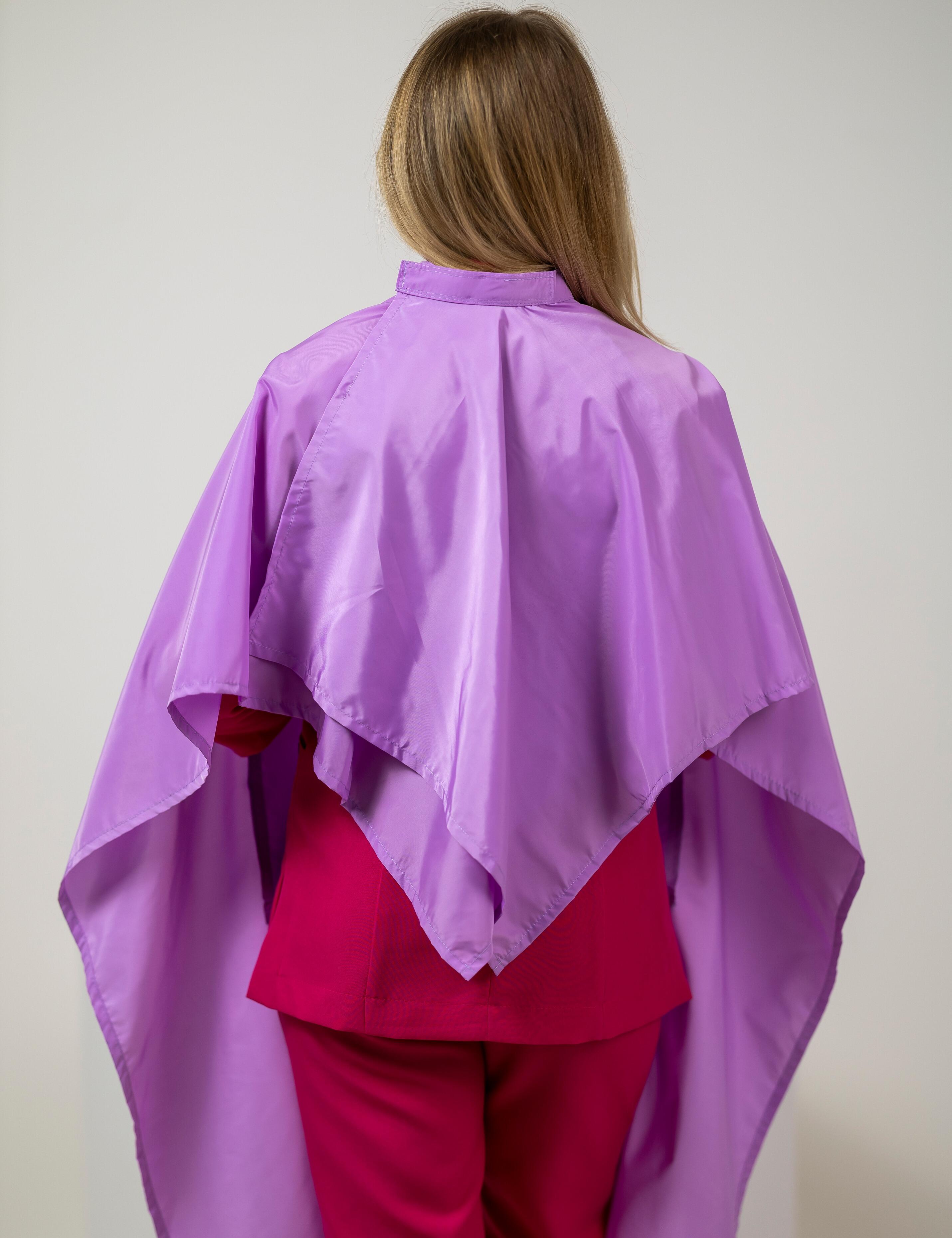 Lilac salon cape with arm slits for barbers and stylists