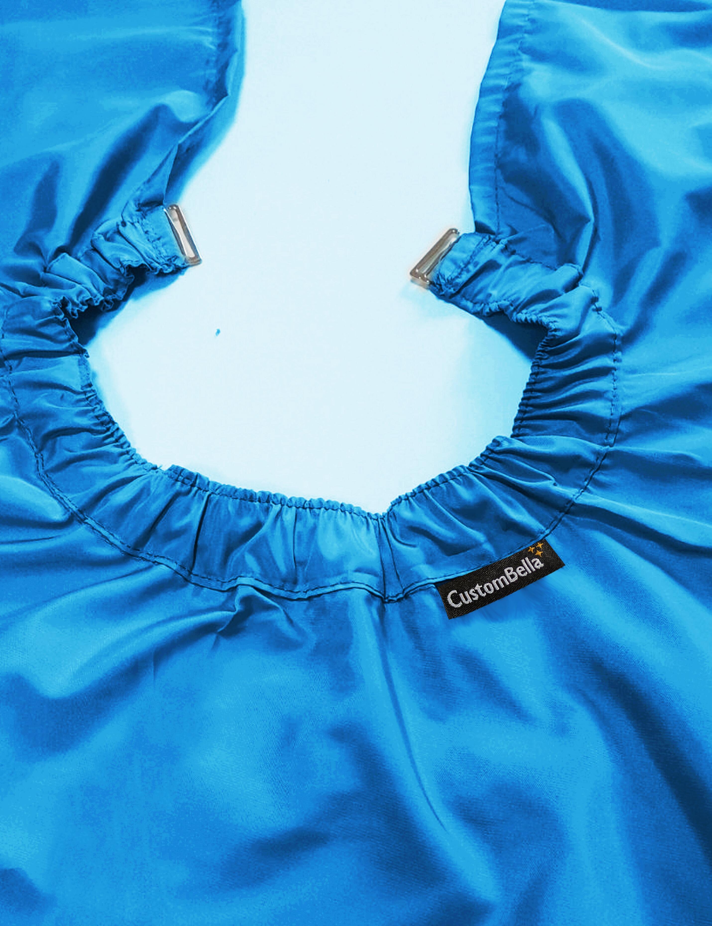 Turquoise salon cape with hand slits and secure clip closure