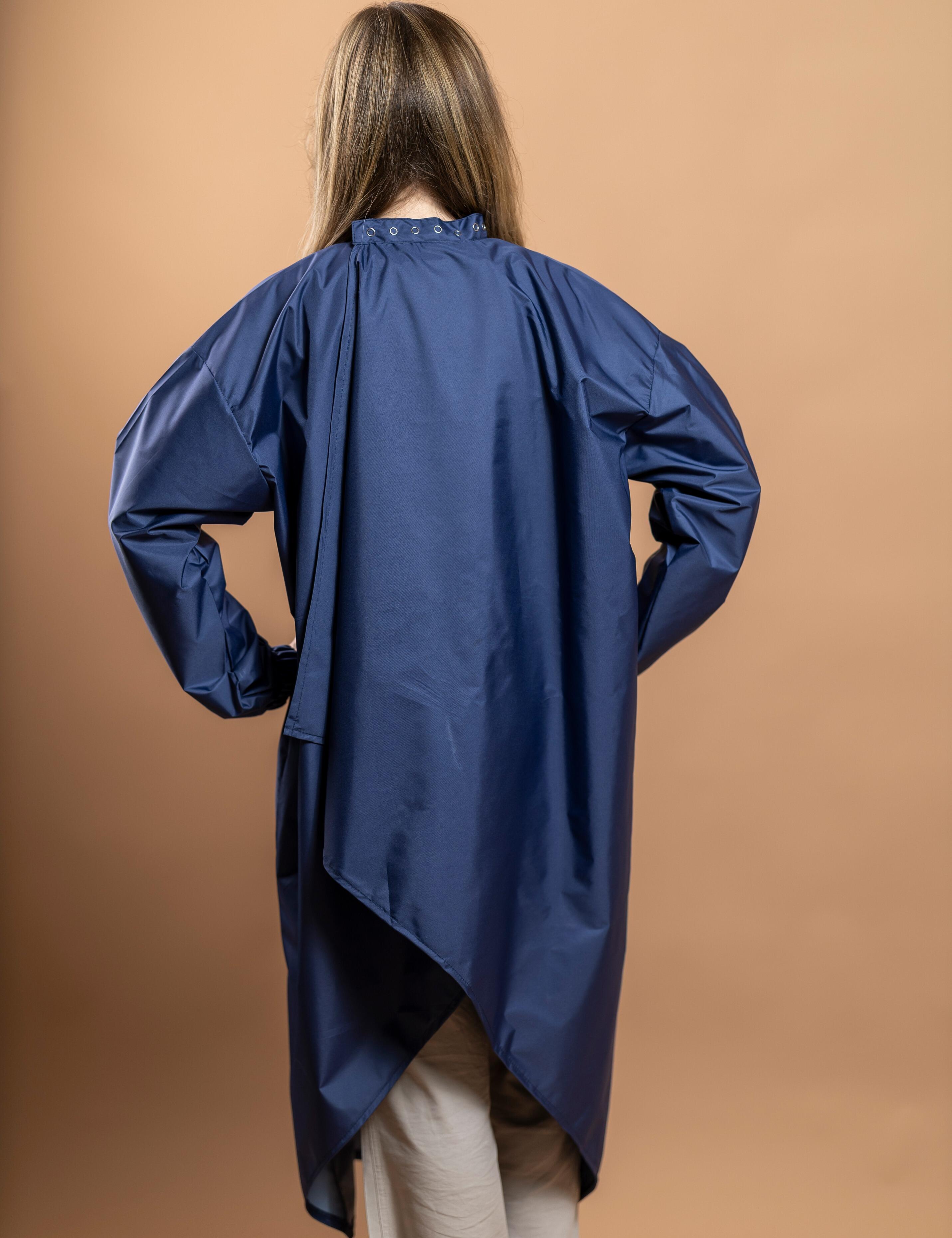 High end navy client cape with sleeves offering ultimate coverage and a classy look for US hair studios