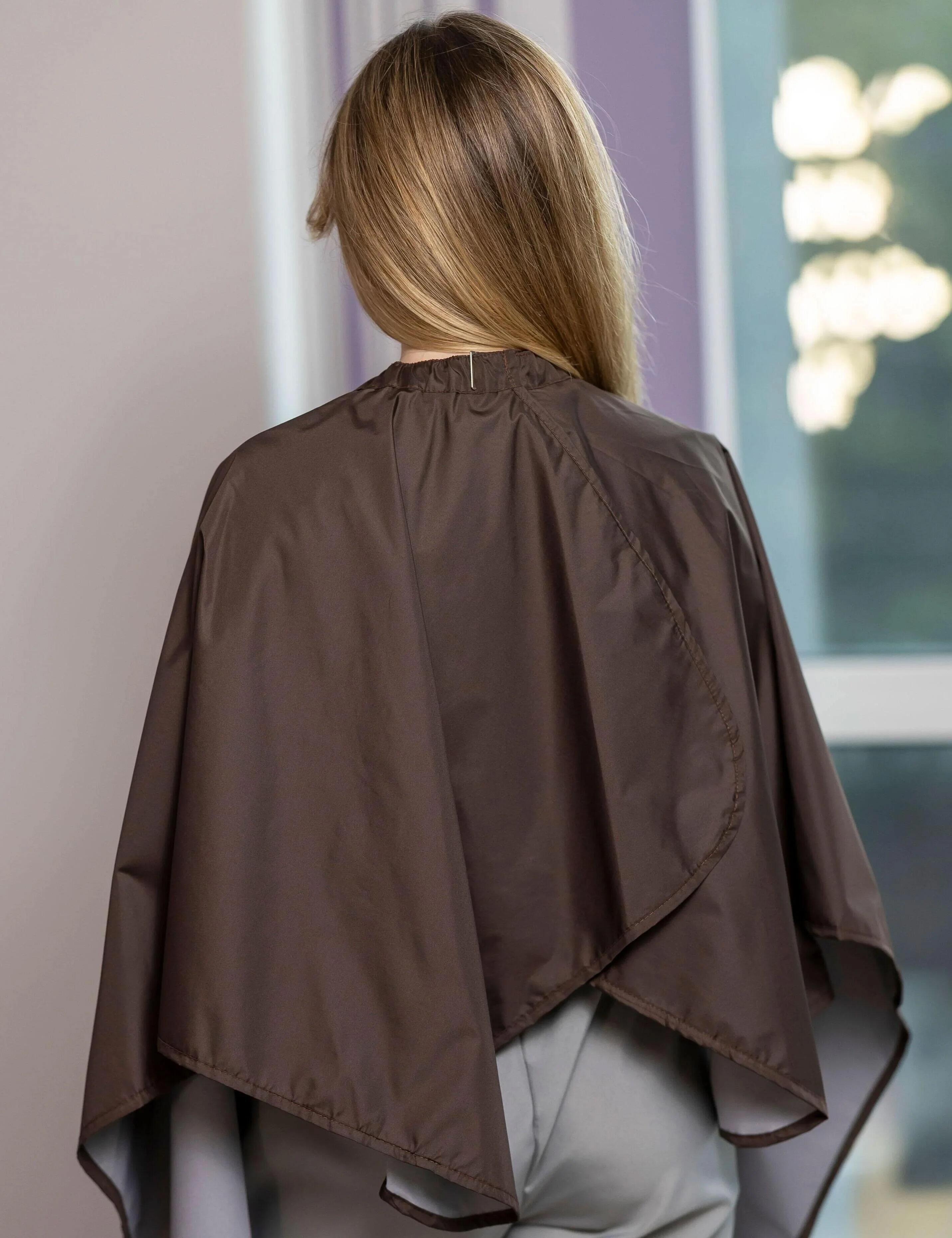 Stain-resistant chocolate barber gown to keep clients safe and dry