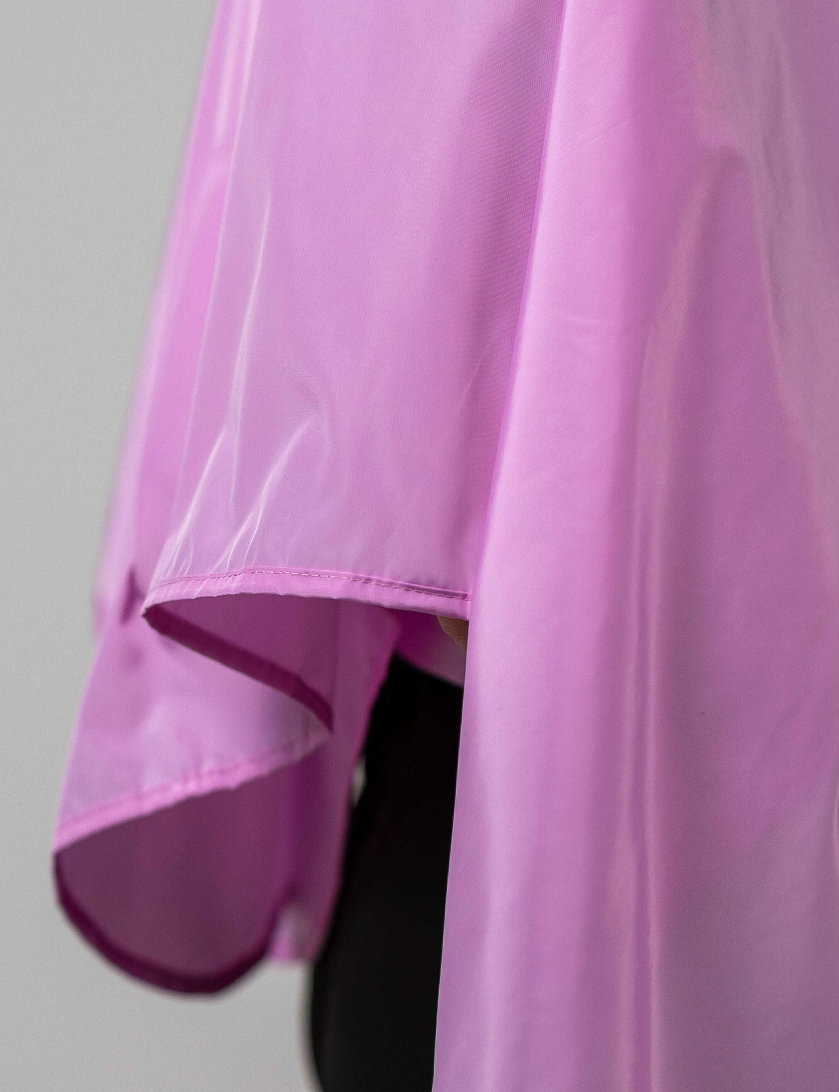 Vibrant pink hair salon cape tailored for boutique beauty businesses.