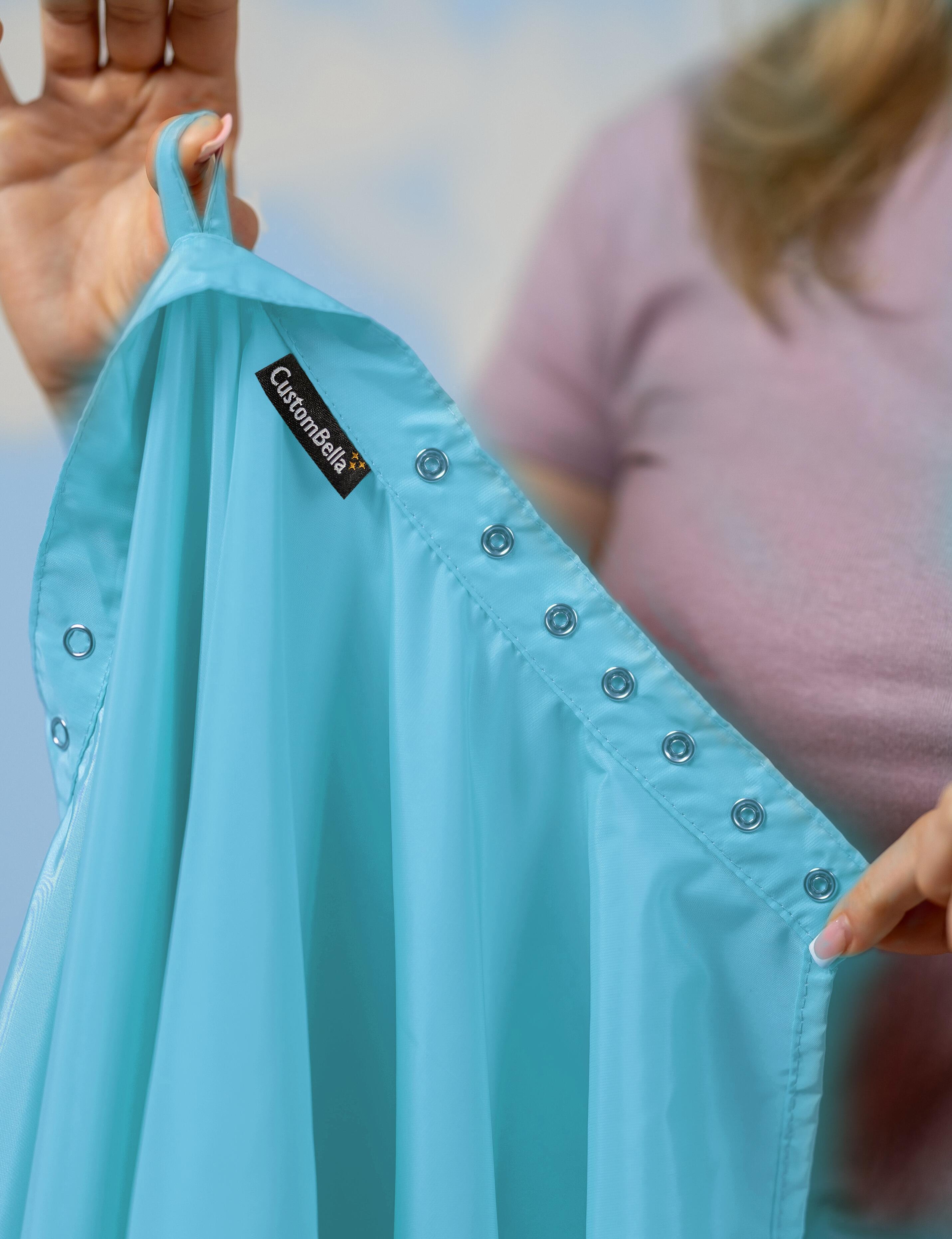 Aqua blue salon cape with hand slits and adjustable snap closure