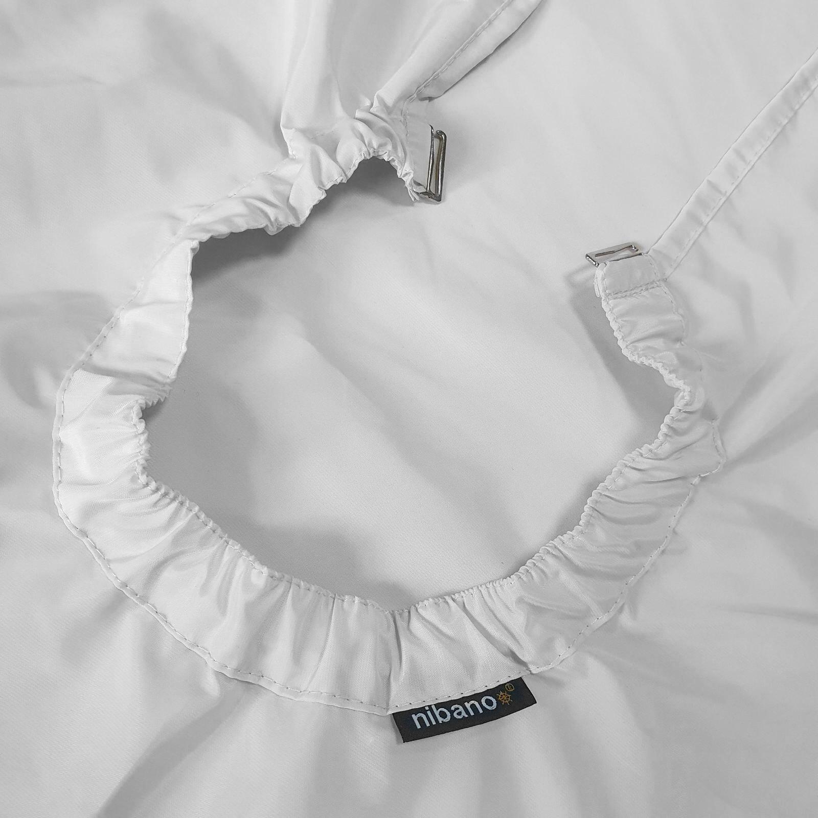White barber cape featuring durable clip fasteners for US salons