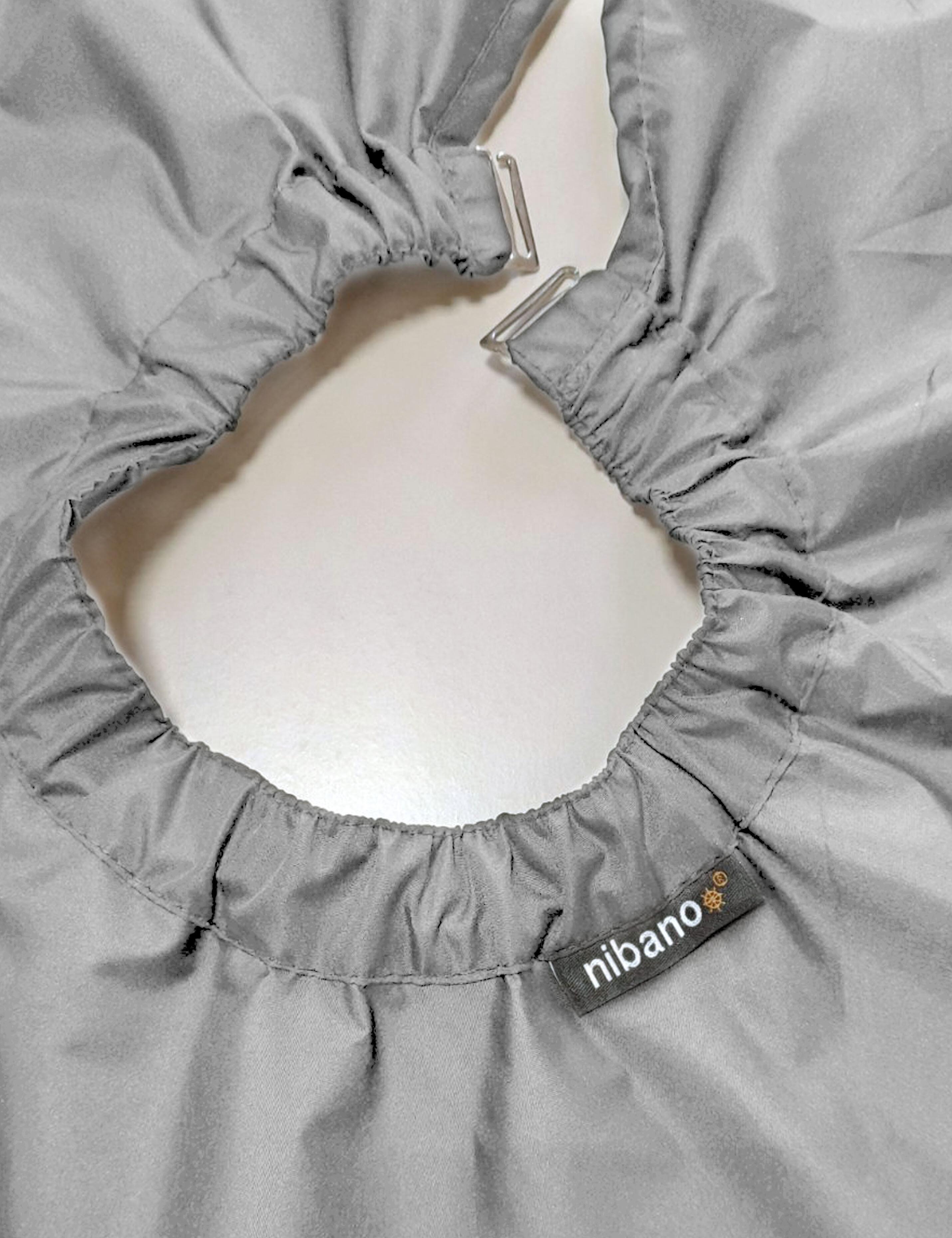 Professional grey barber cape featuring durable clip fasteners for US salons