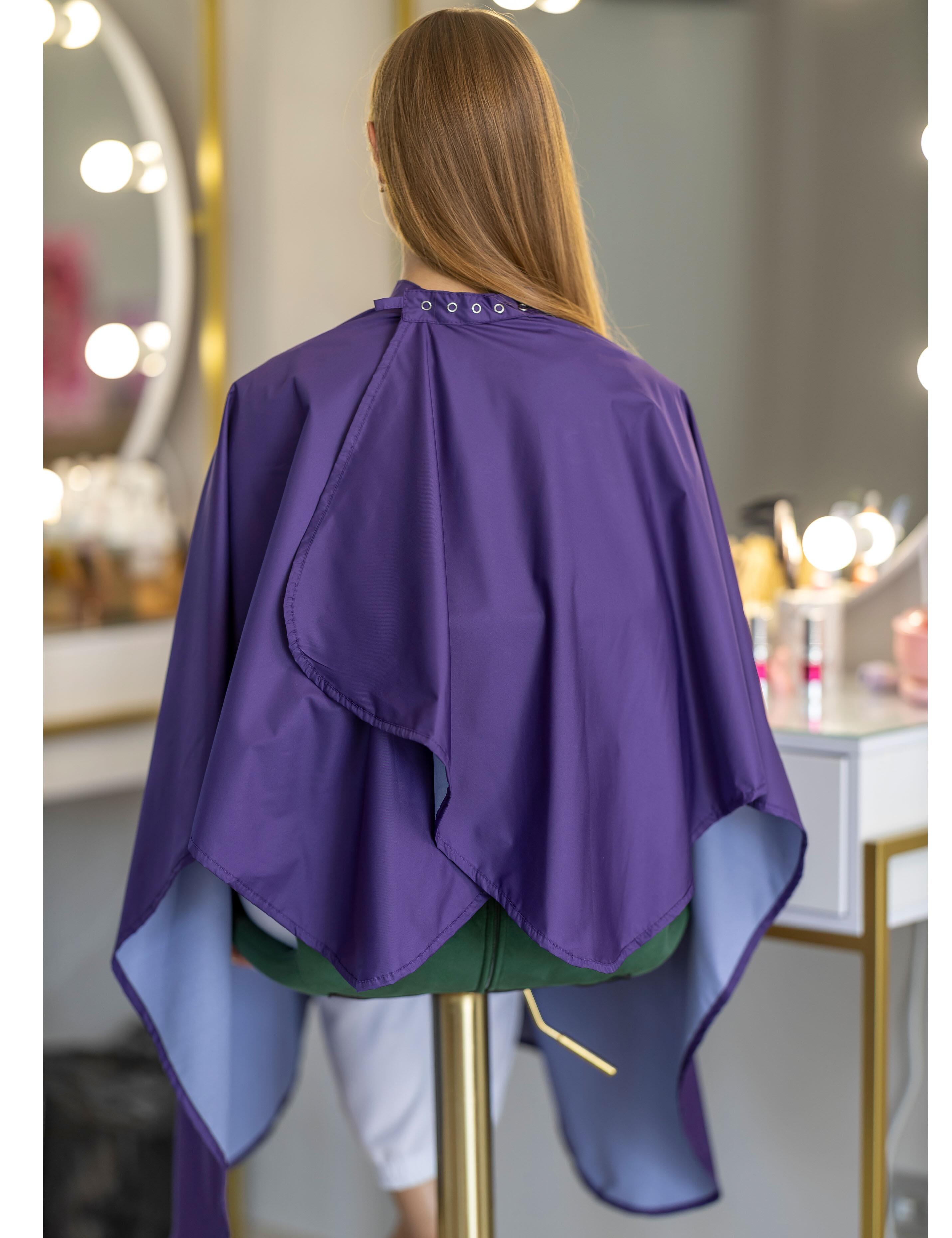 Stain-resistant purple barber gown built for everyday commercial hair treatments.