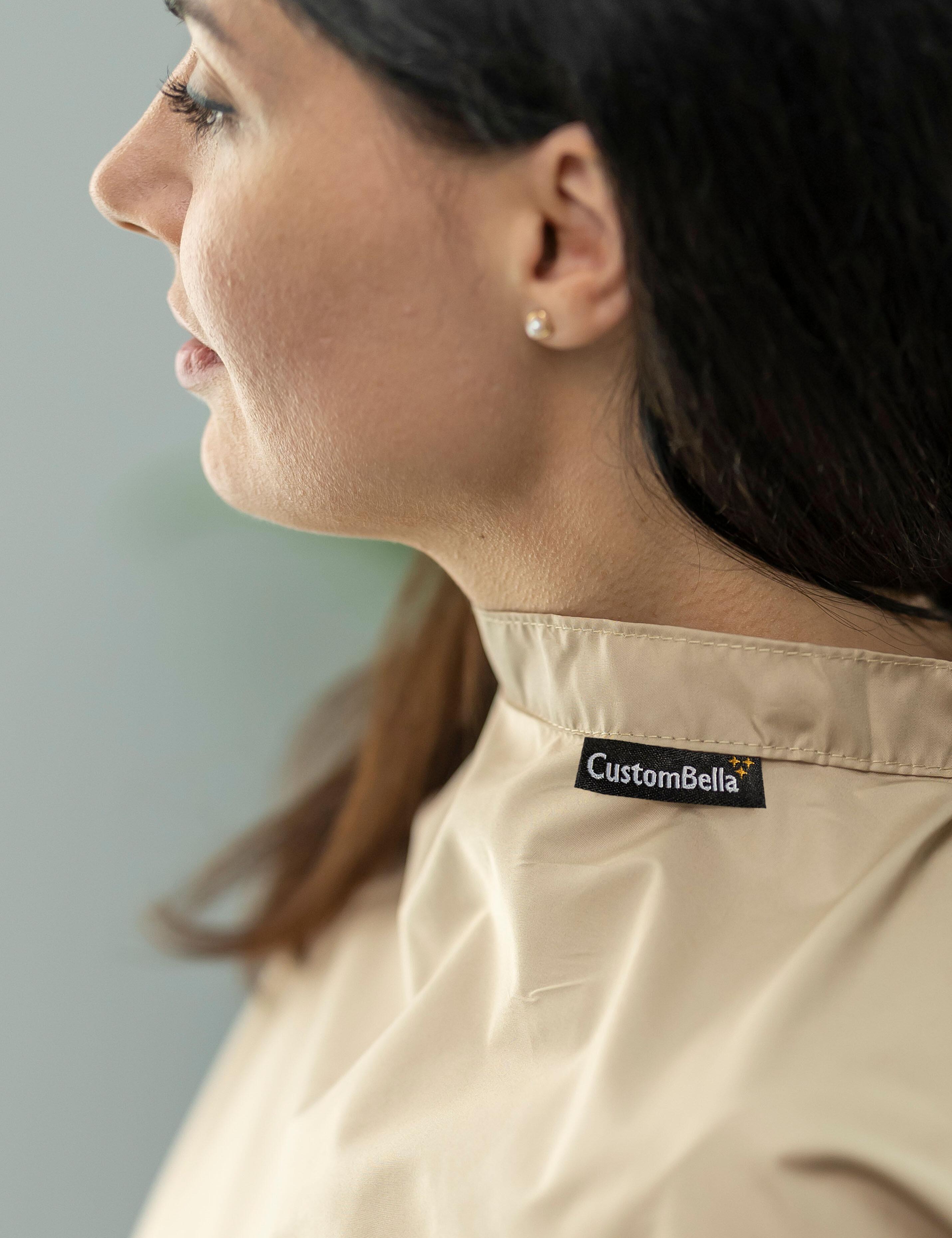 Cappuccino salon cape with arm slits for barbers and stylists