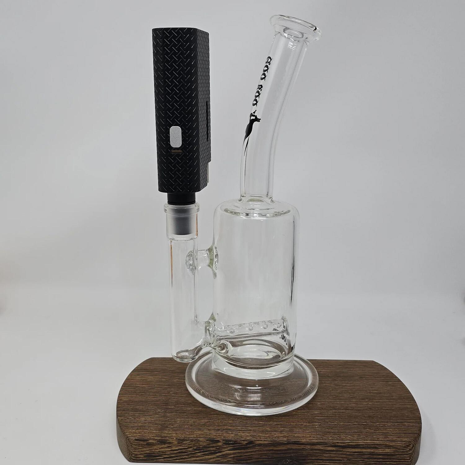 Frolic vaporizer attached to glass water tool using water pipe adapter
