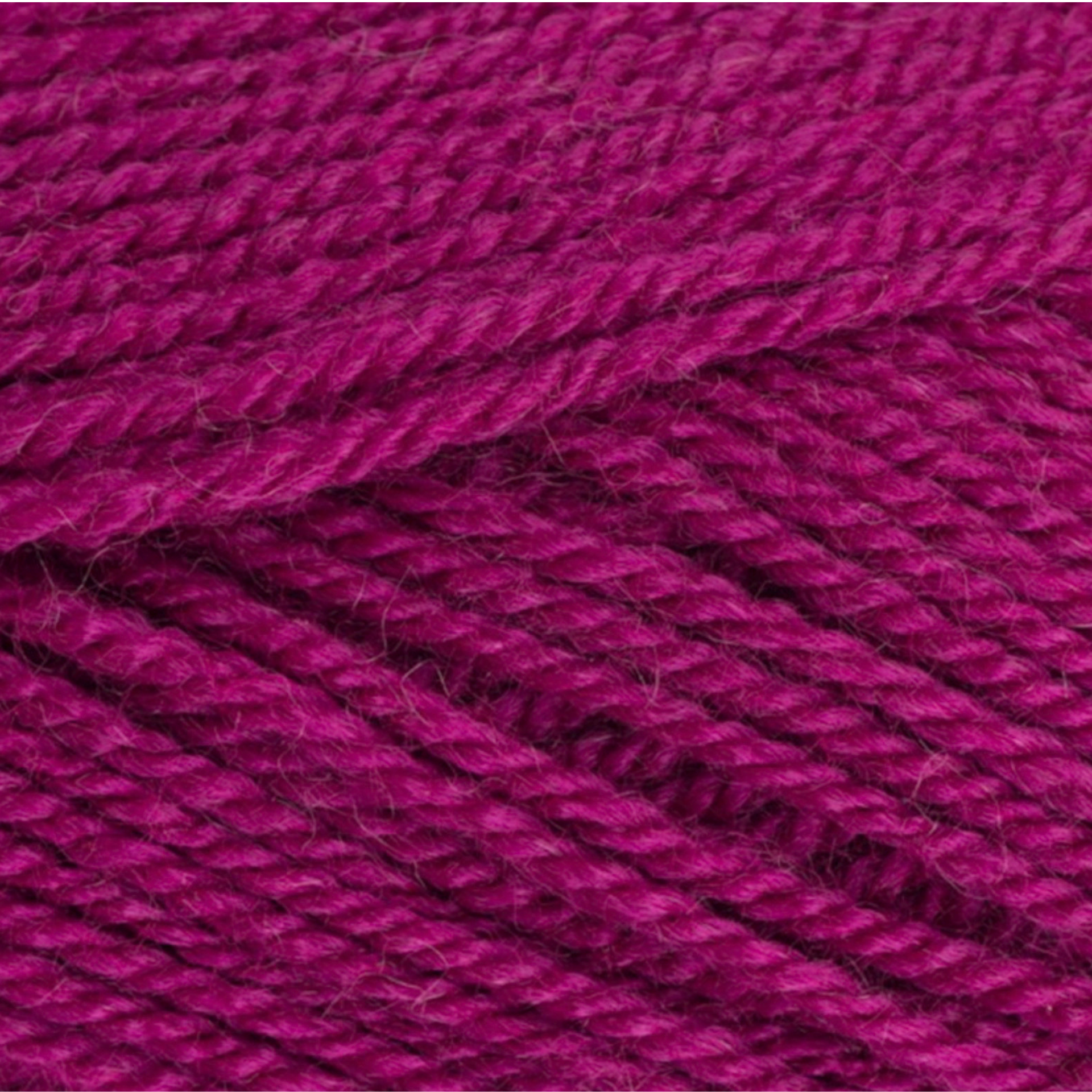 Close-up of StyleCraft Special DK yarn in boysenberry shade showing the twist and texture.