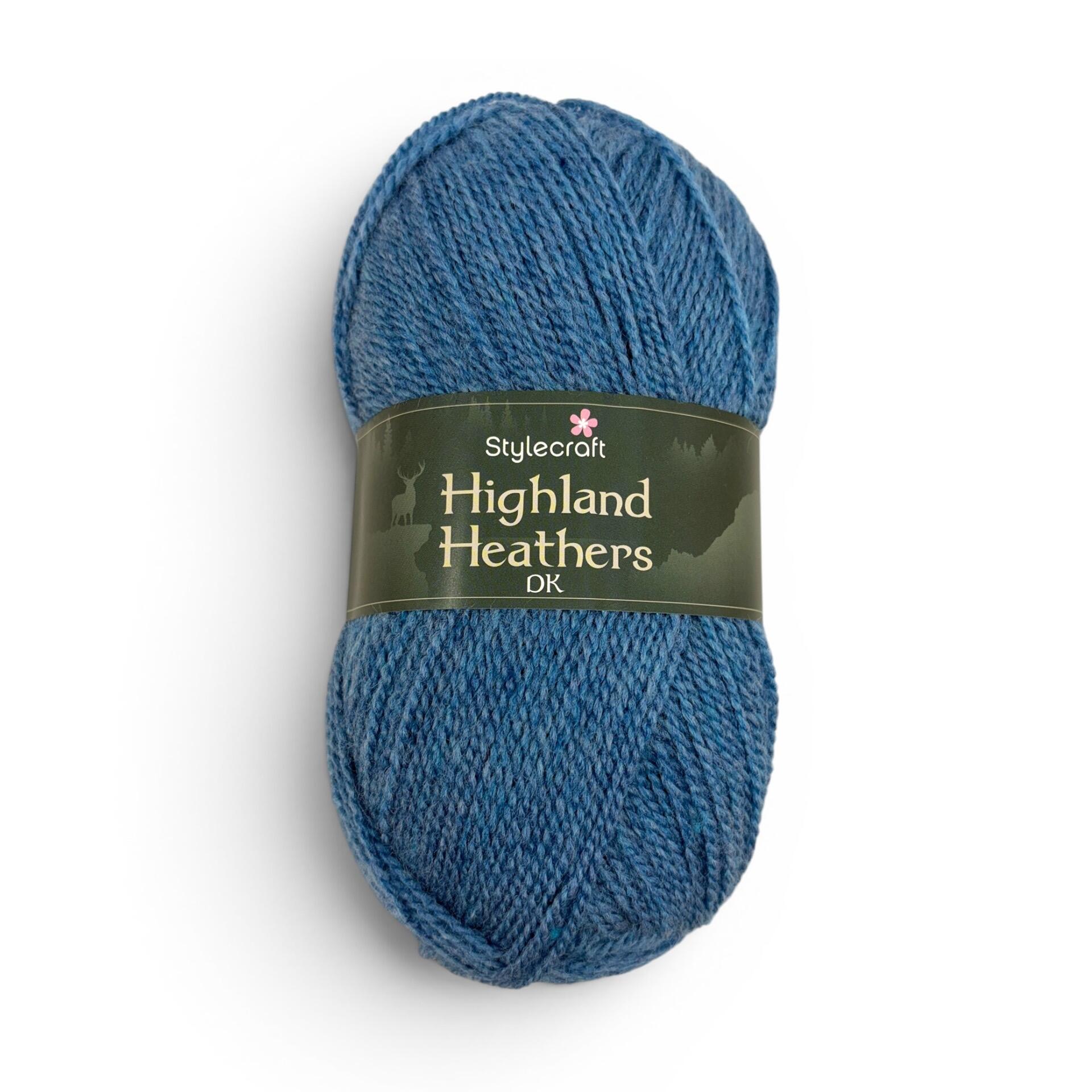 Stylecraft Highland Heathers DK yarn ball in Skye 7241, a soft blue tweed-effect 100g acrylic DK yarn with green Highland Heathers label.
