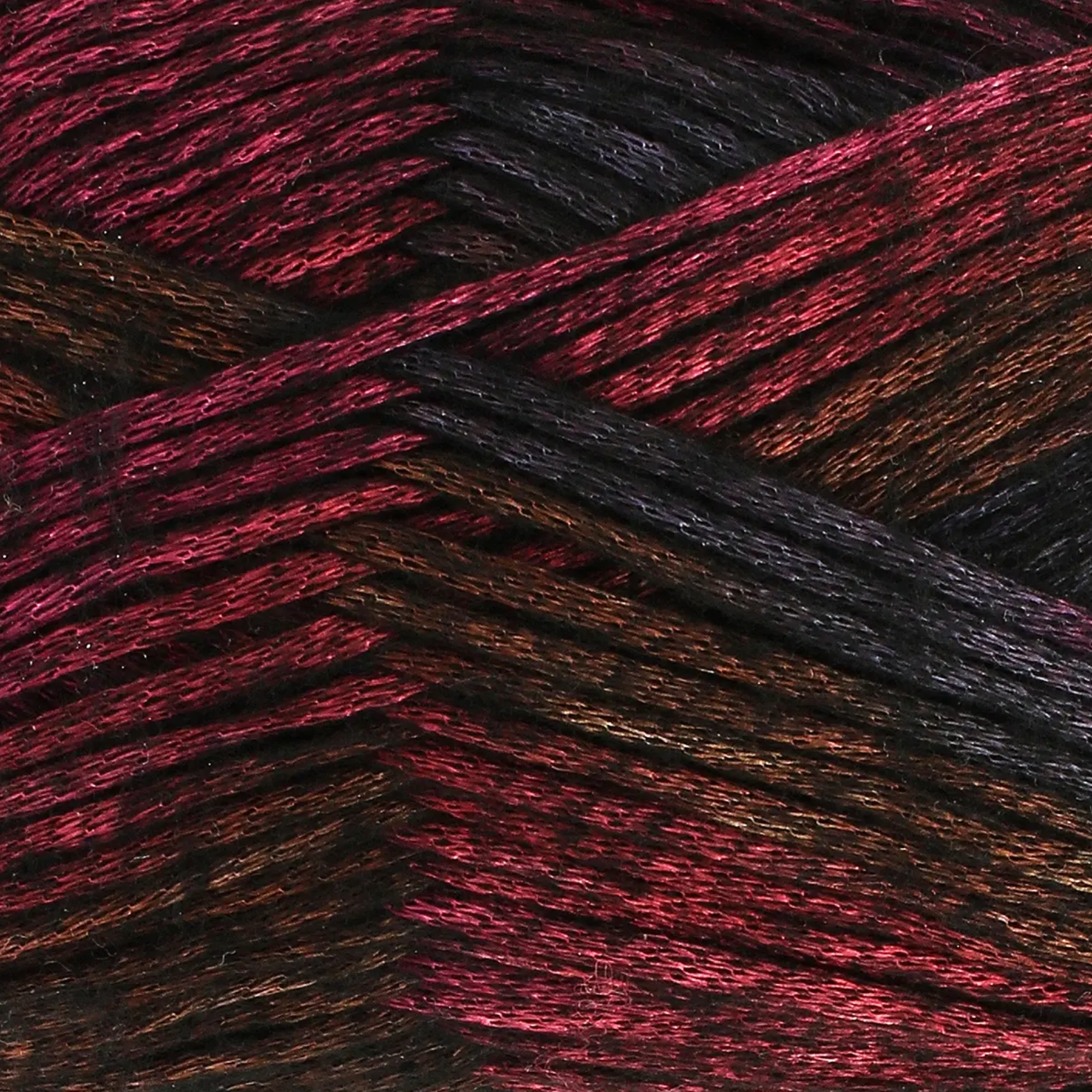 Close-up of Firefly Aran Firebug showing red to black colour shift and copper shimmer