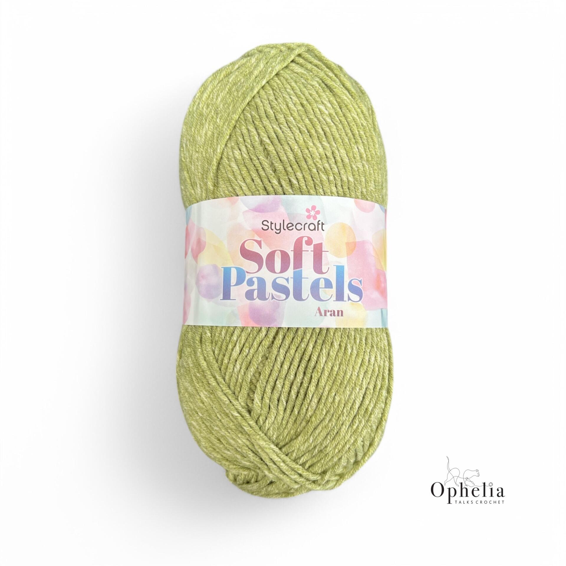 Ball of Stylecraft Soft Pastels Aran yarn in Apple (5651), showcasing its soft pastel green color and smooth texture.