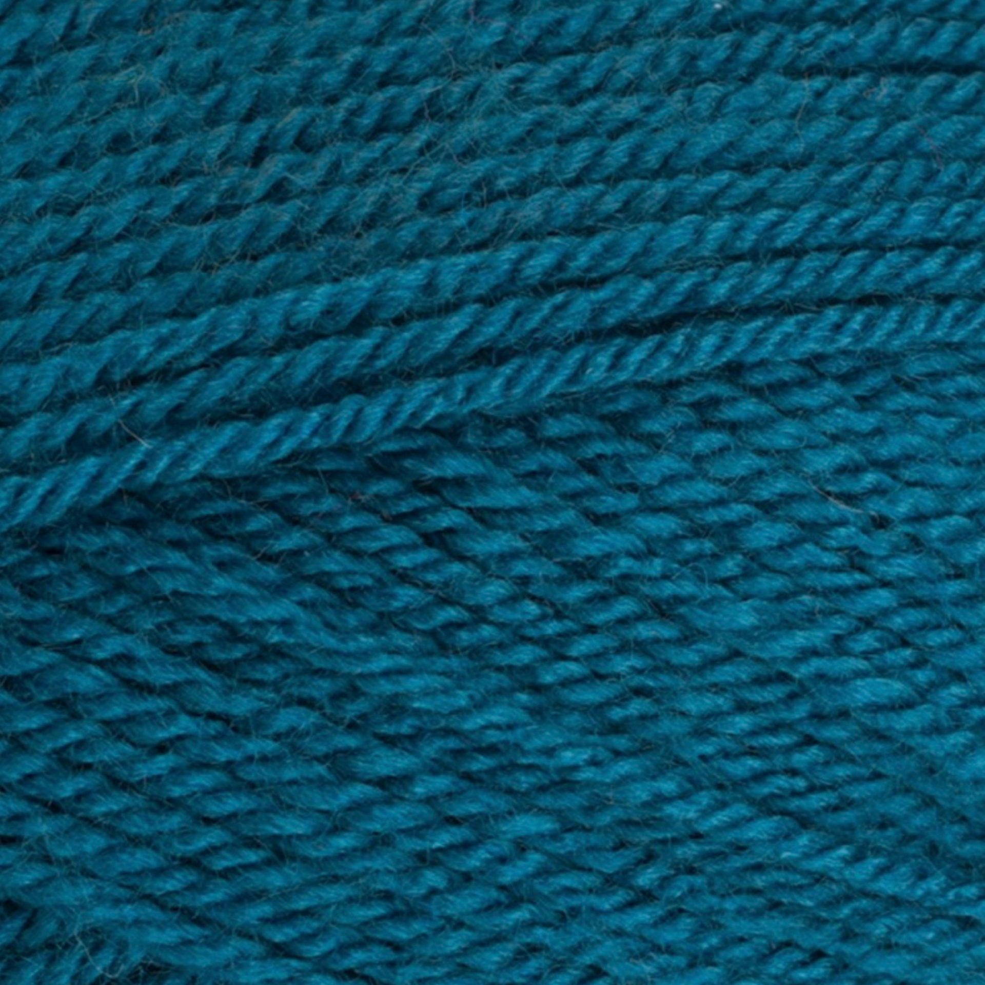 Close-up of Wendy Supreme DK yarn in the colour Petrol (WD79), showing the rich deep teal-blue shade and smooth, even double knit texture.