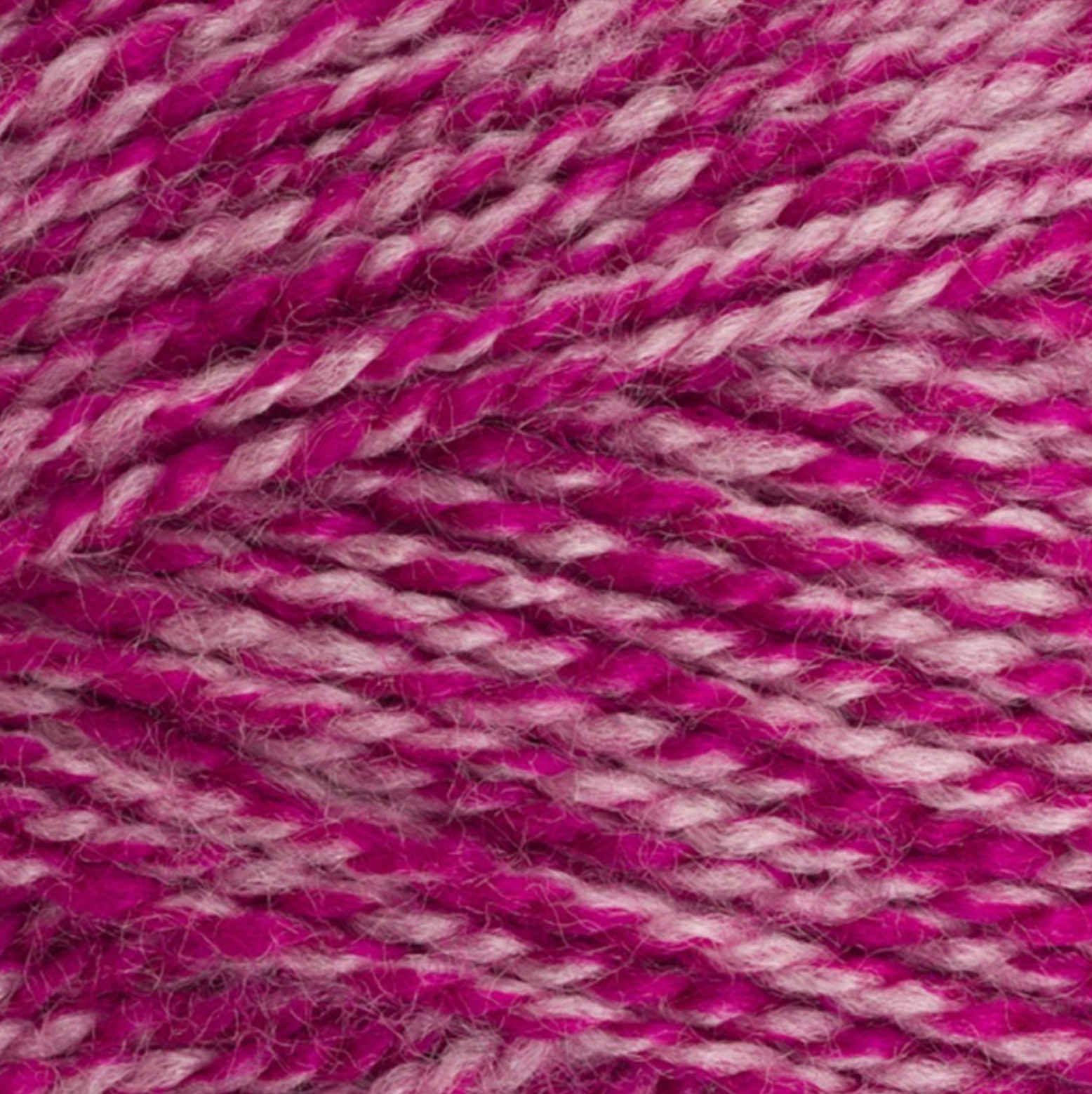 Close-up of StyleCraft Special DK yarn in carnation shade showing the twist and texture.