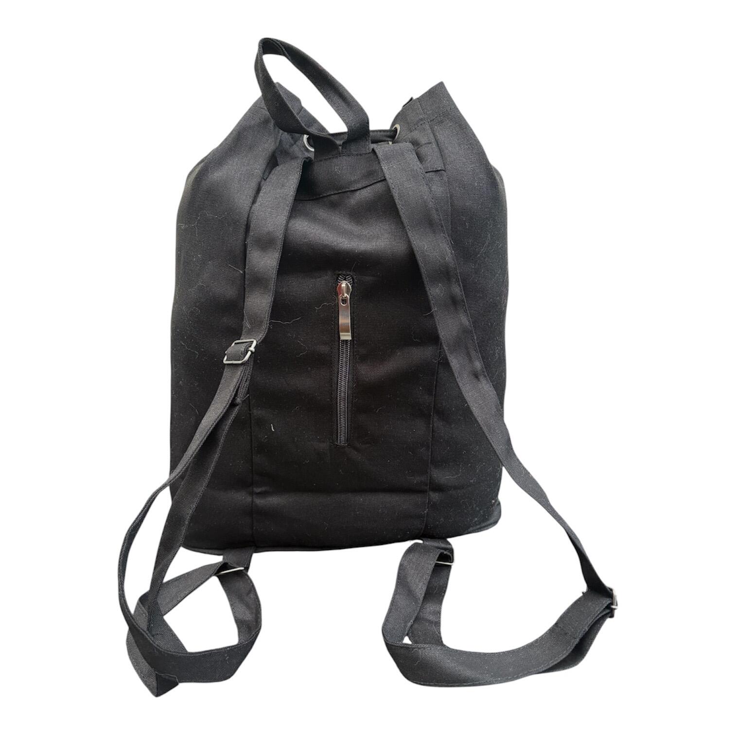 Back view of Ophelia Talks Crochet black canvas rucksack with adjustable straps and rear zip pocket.