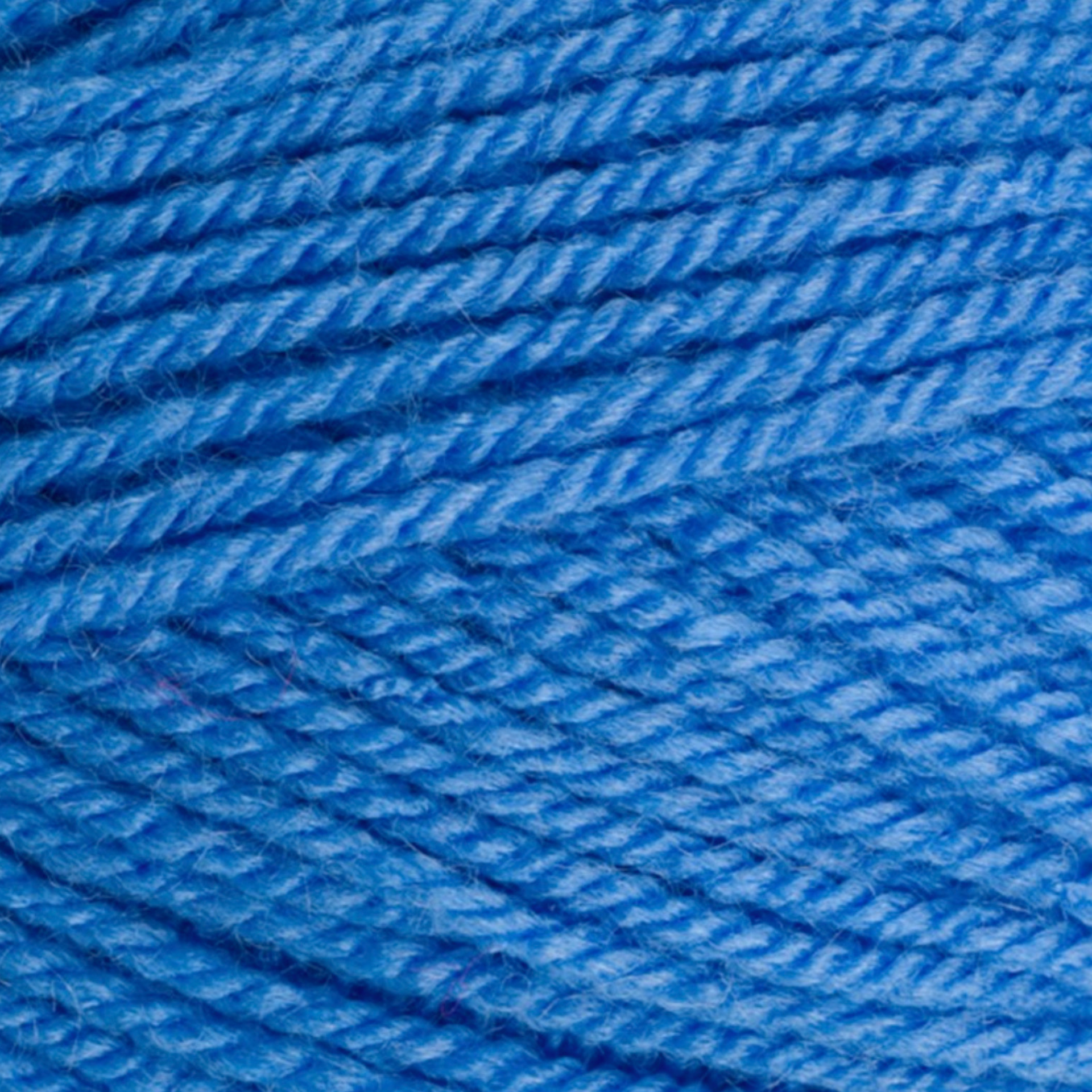 Close-up of StyleCraft Special DK yarn in aster shade showing the twist and texture.