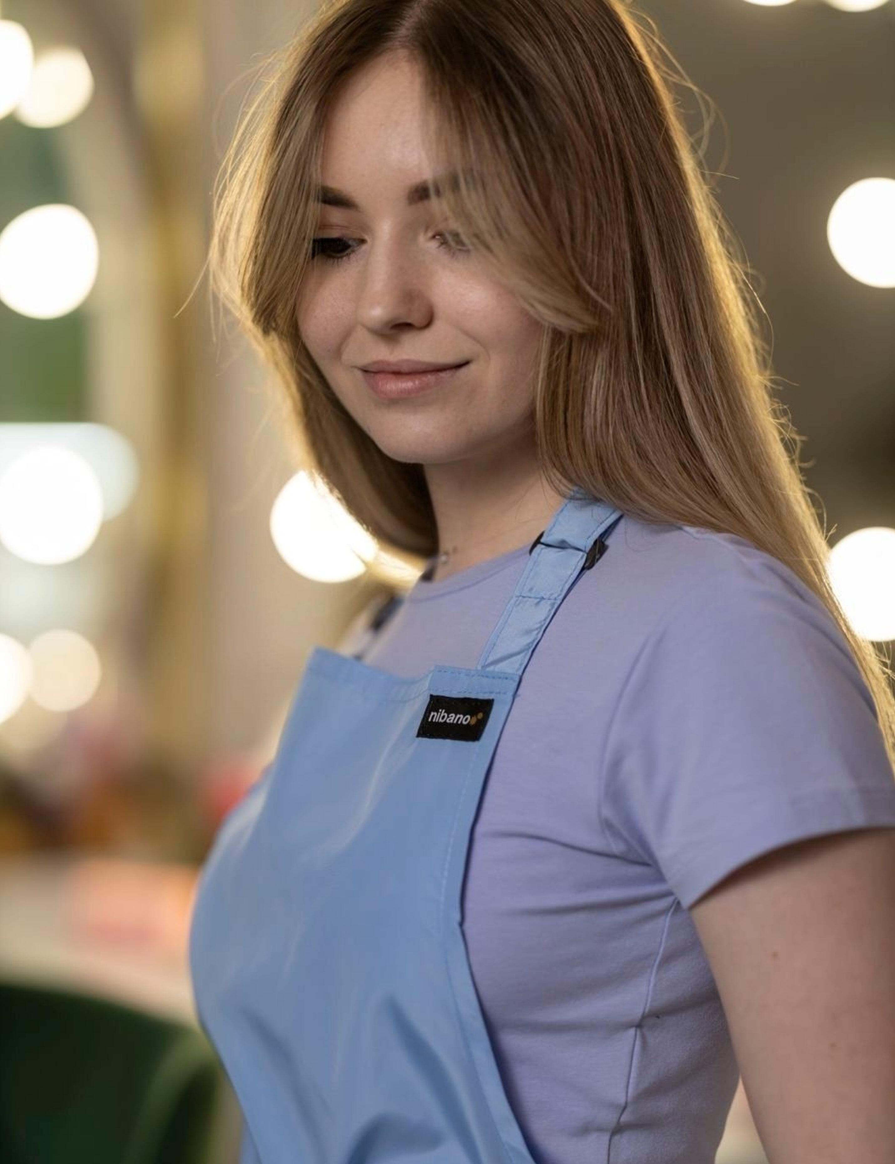 Comfortable waterproof hairdresser apron light blue colour