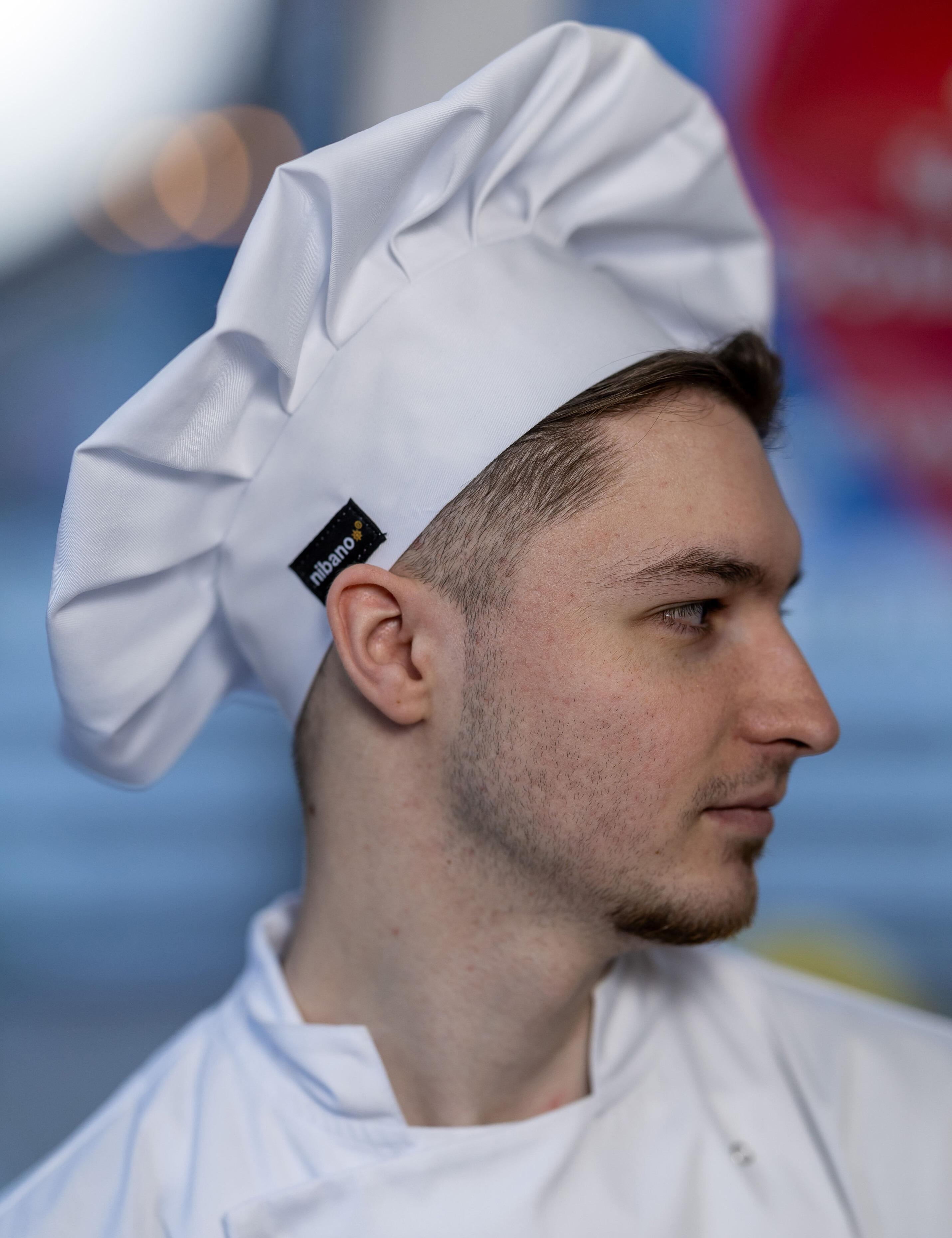 Traditional white chef’s hat for professional chefs and bakers