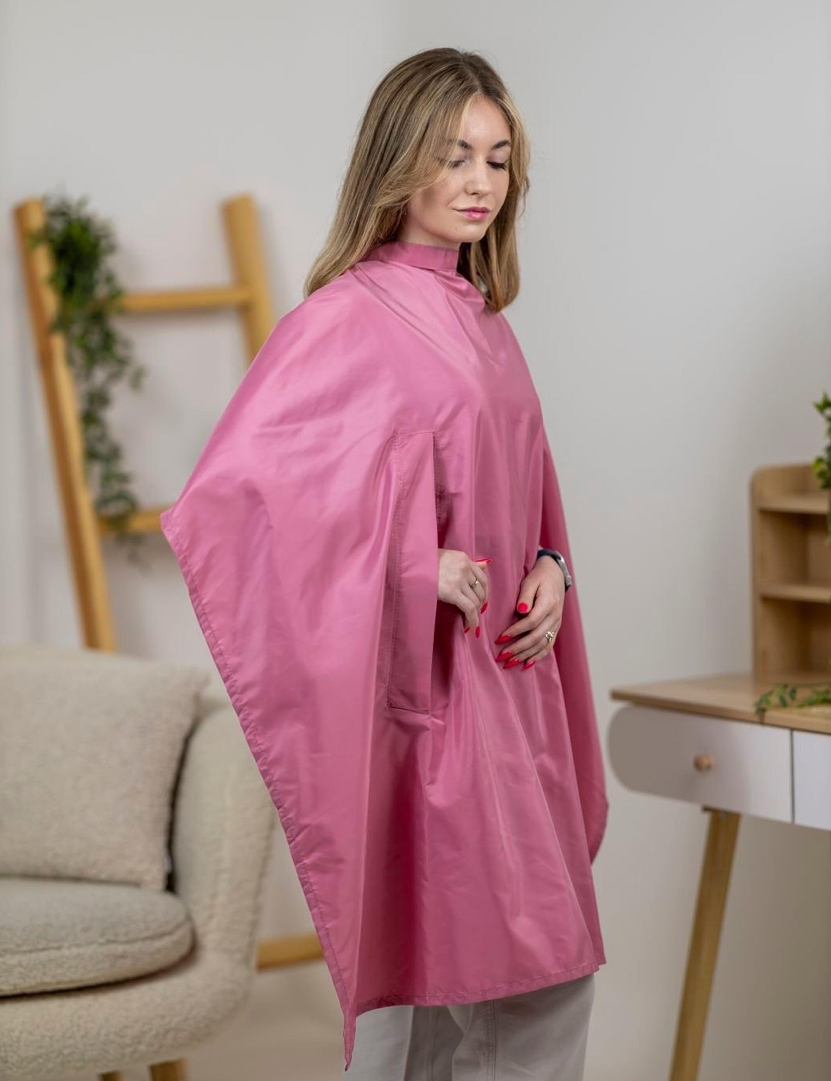 Luxury rose gold hairdressing cape in modern British beauty salon
