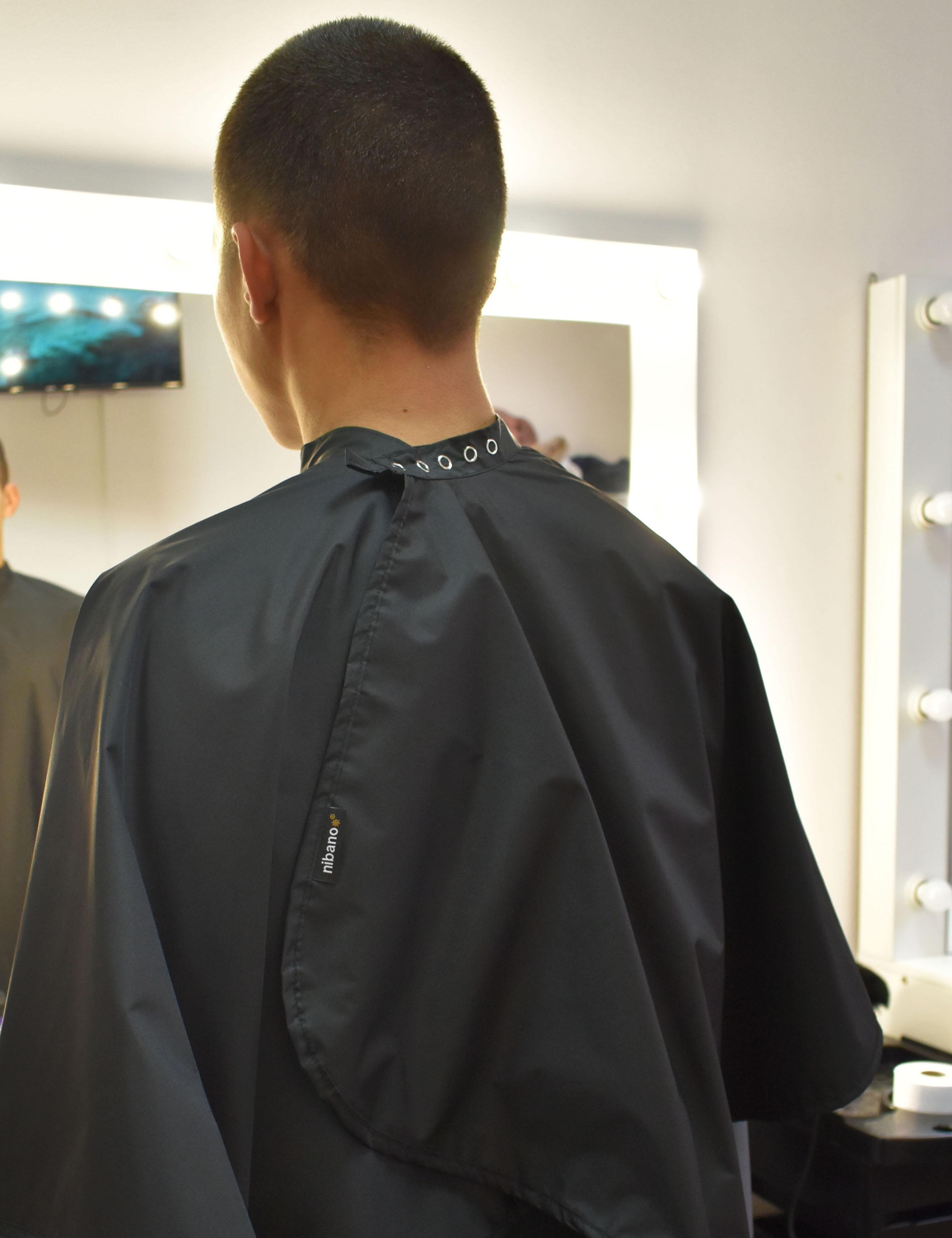 Black Barber cape with poppers closing