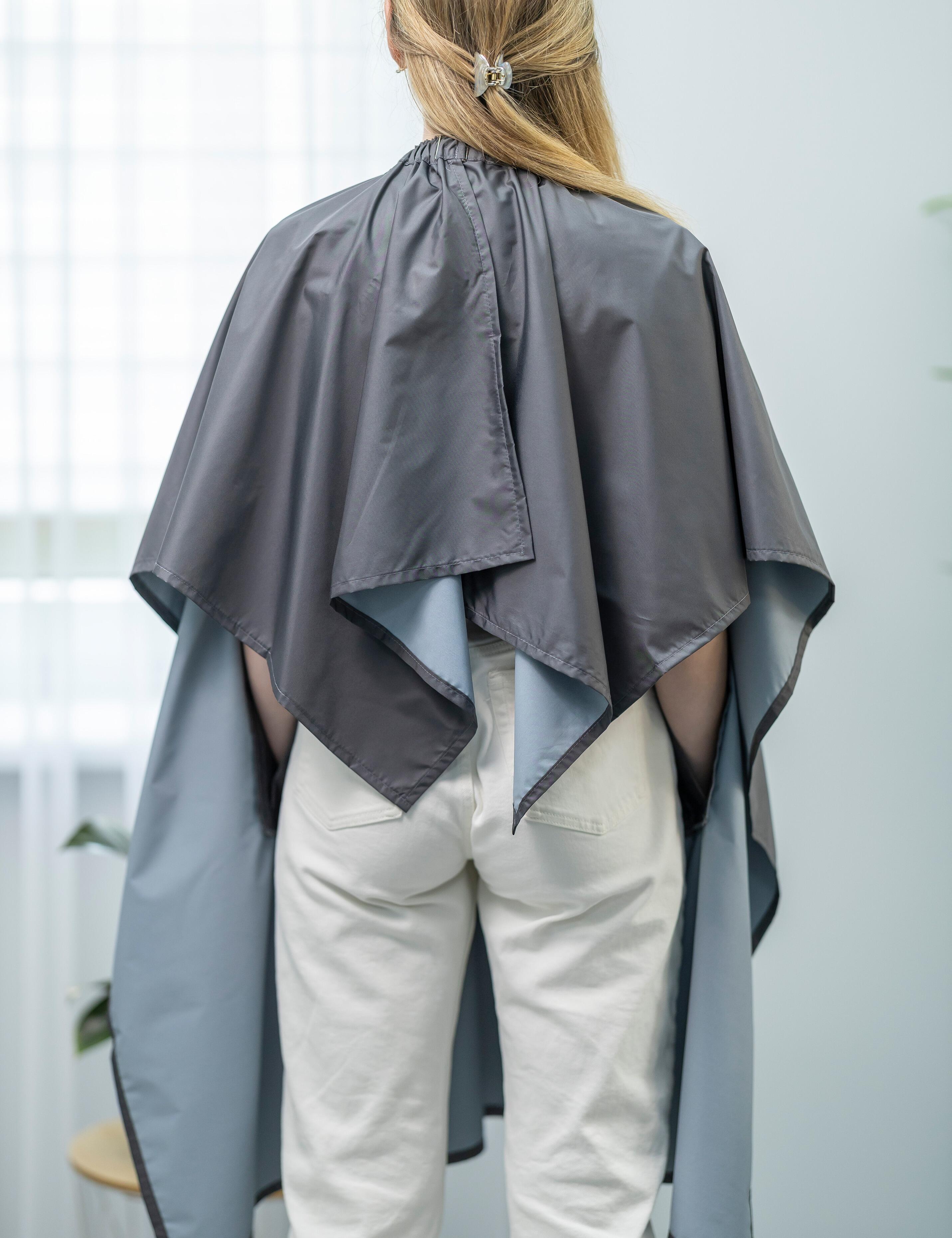 Cape for hairdressers with hand slits dark grey Nibano