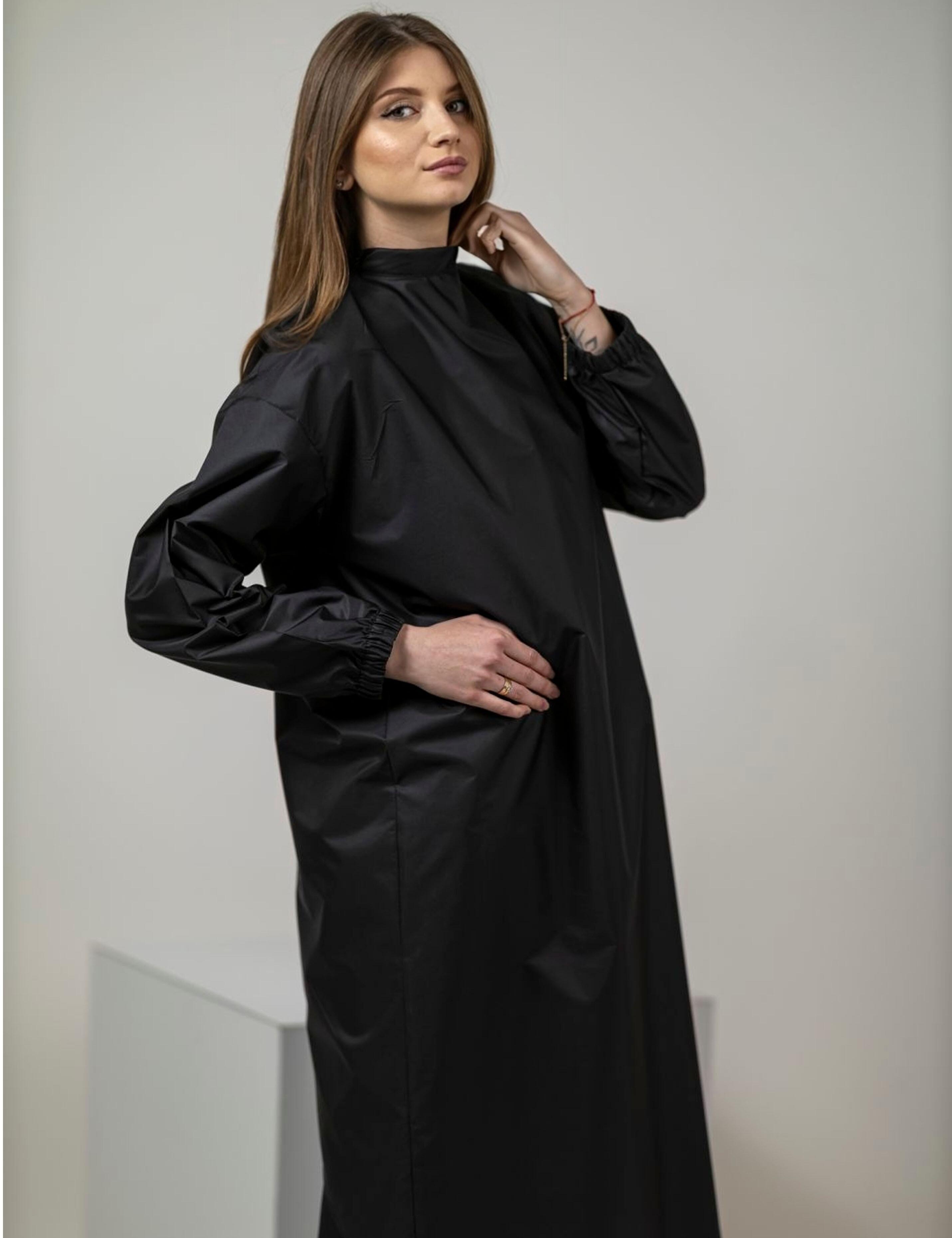Full sleeve black salon cape for hairstylists comfortable and protective