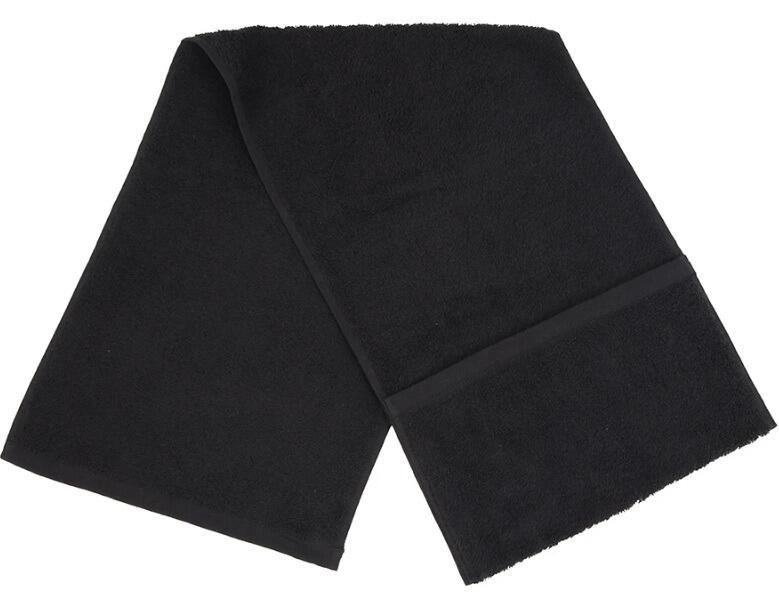 Custom embroidered black gym towel with secure storage pocket personalised at our Experience Shop in Greenock.
