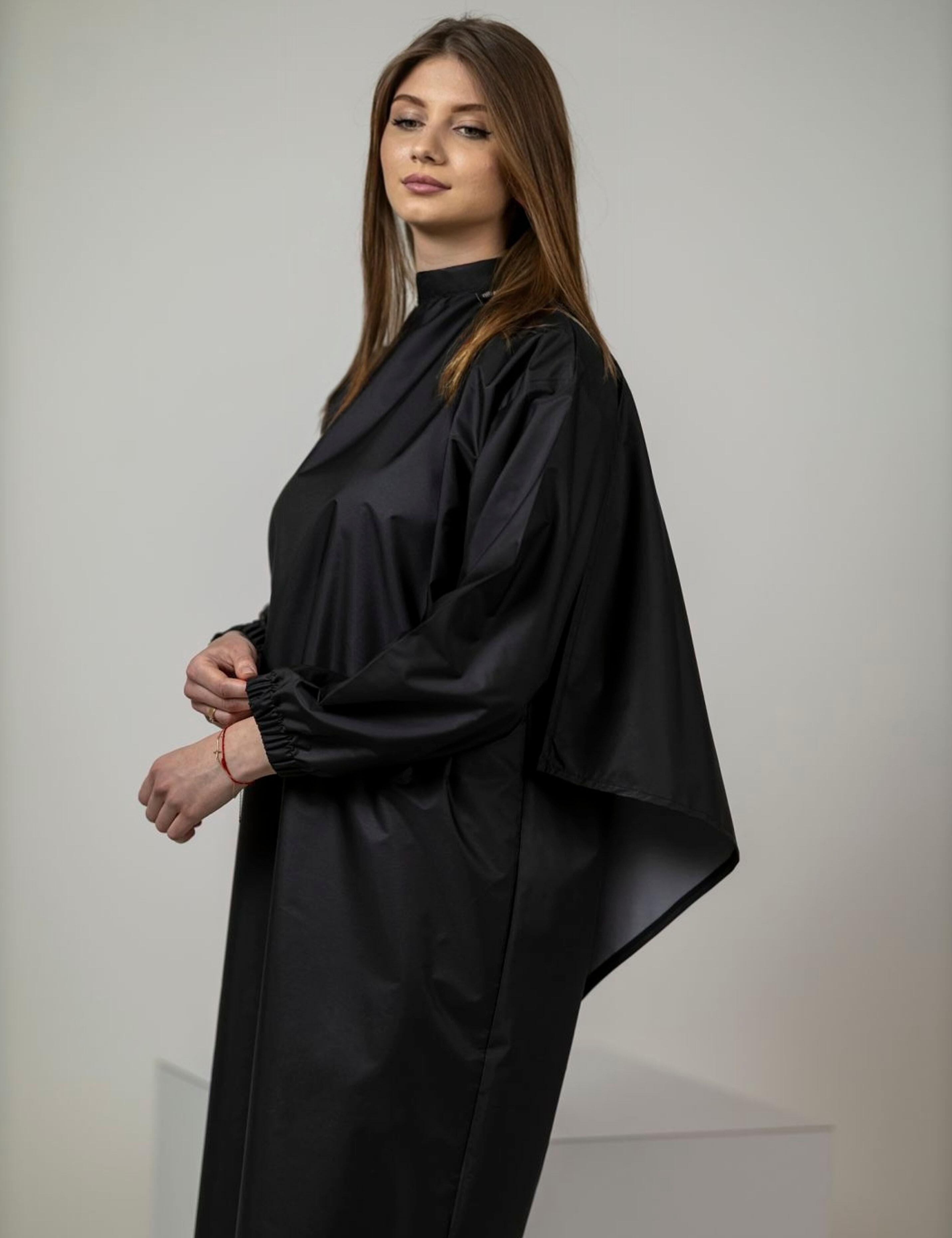 Black beauty salon gown with sleeves for cutting colouring and styling