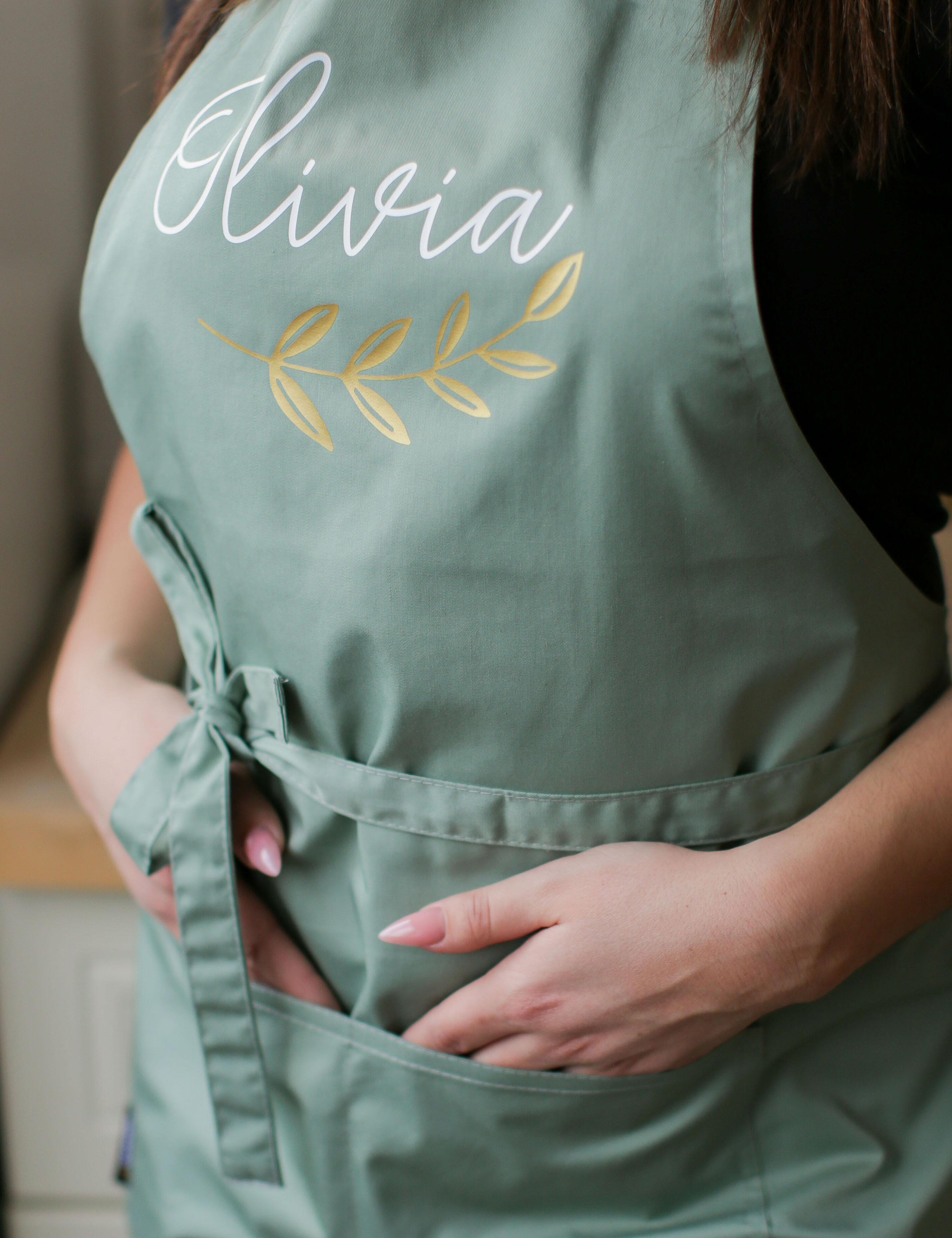 Timeless olive green bib apron for professional use