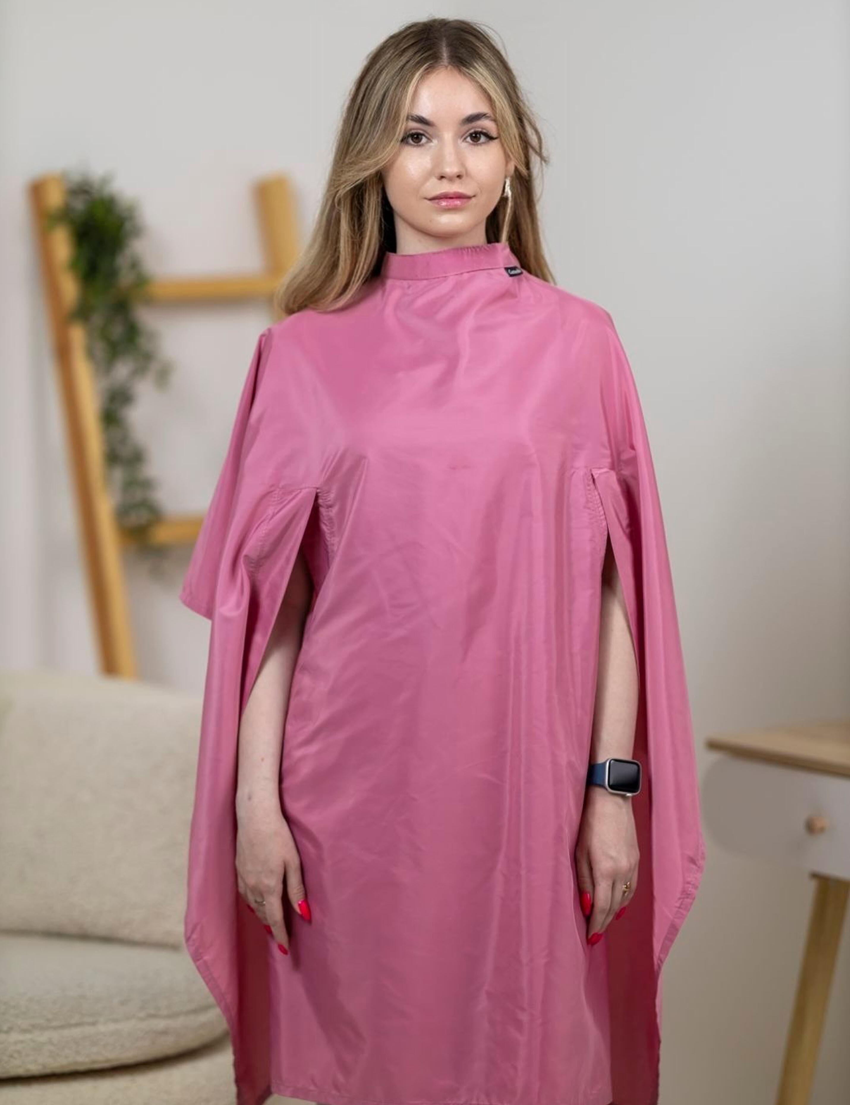 Rose gold salon gown with convenient hand slits for clients