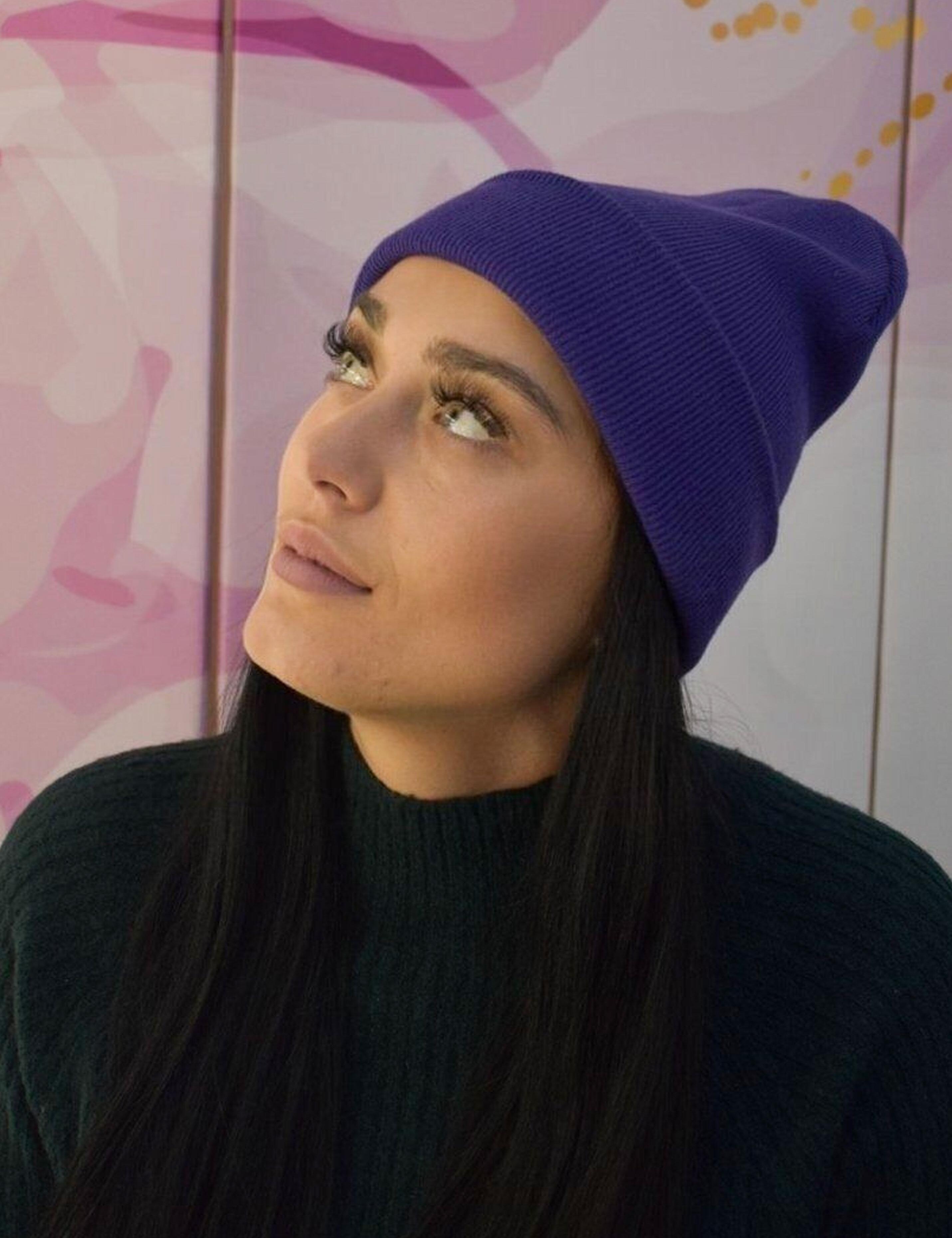 Warm knitted purple beanie