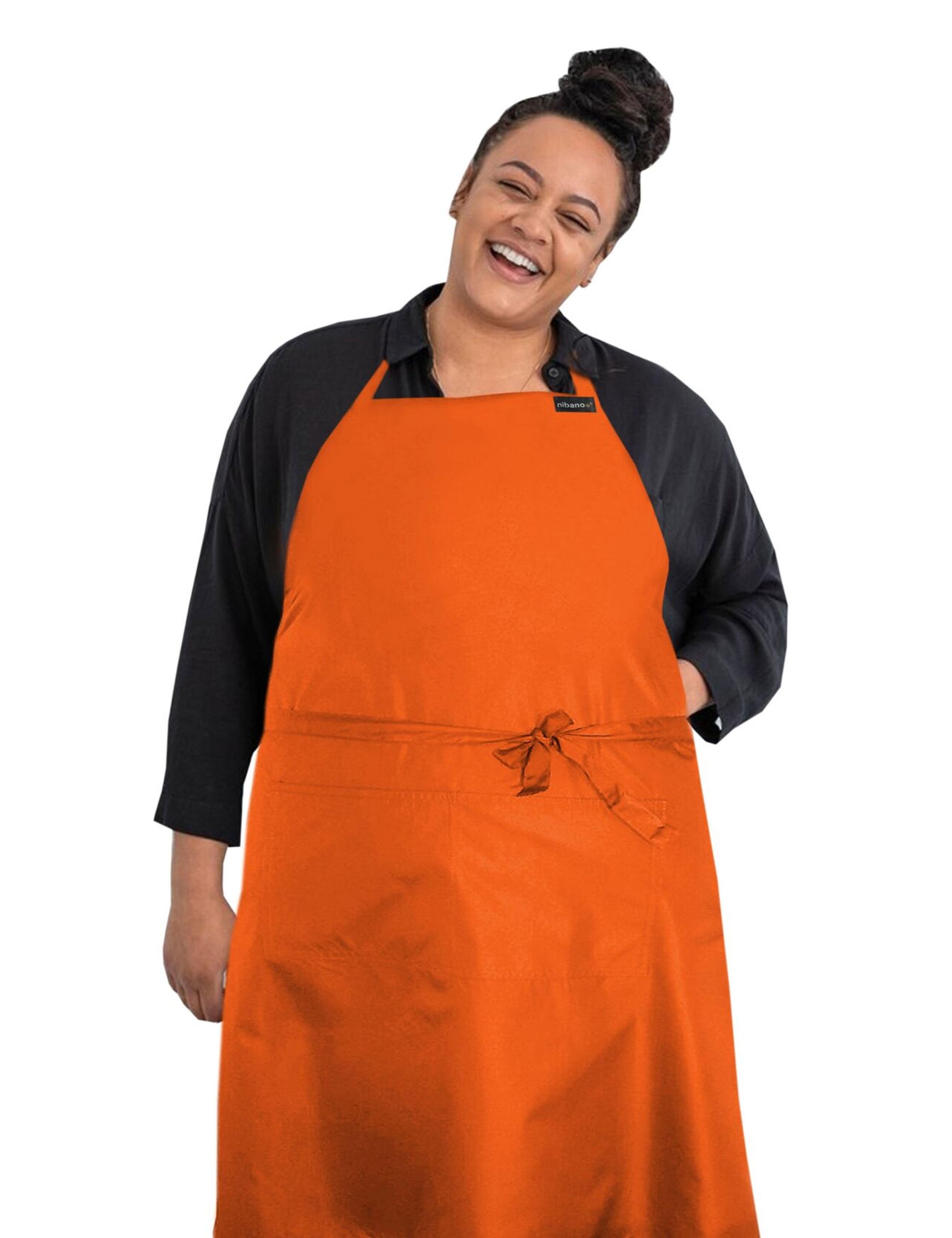 Personalised embroidered orange waterproof barber and salon apron