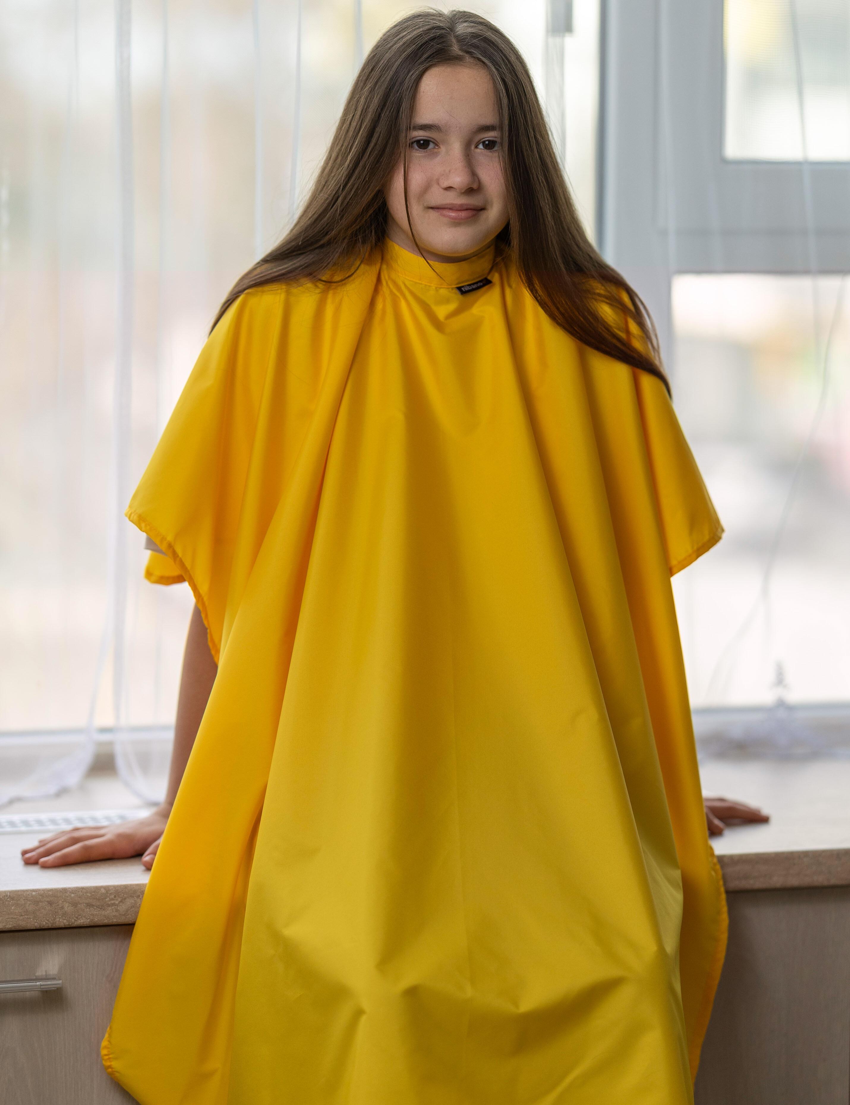 Yellow kids haircut cape with adjustable closure