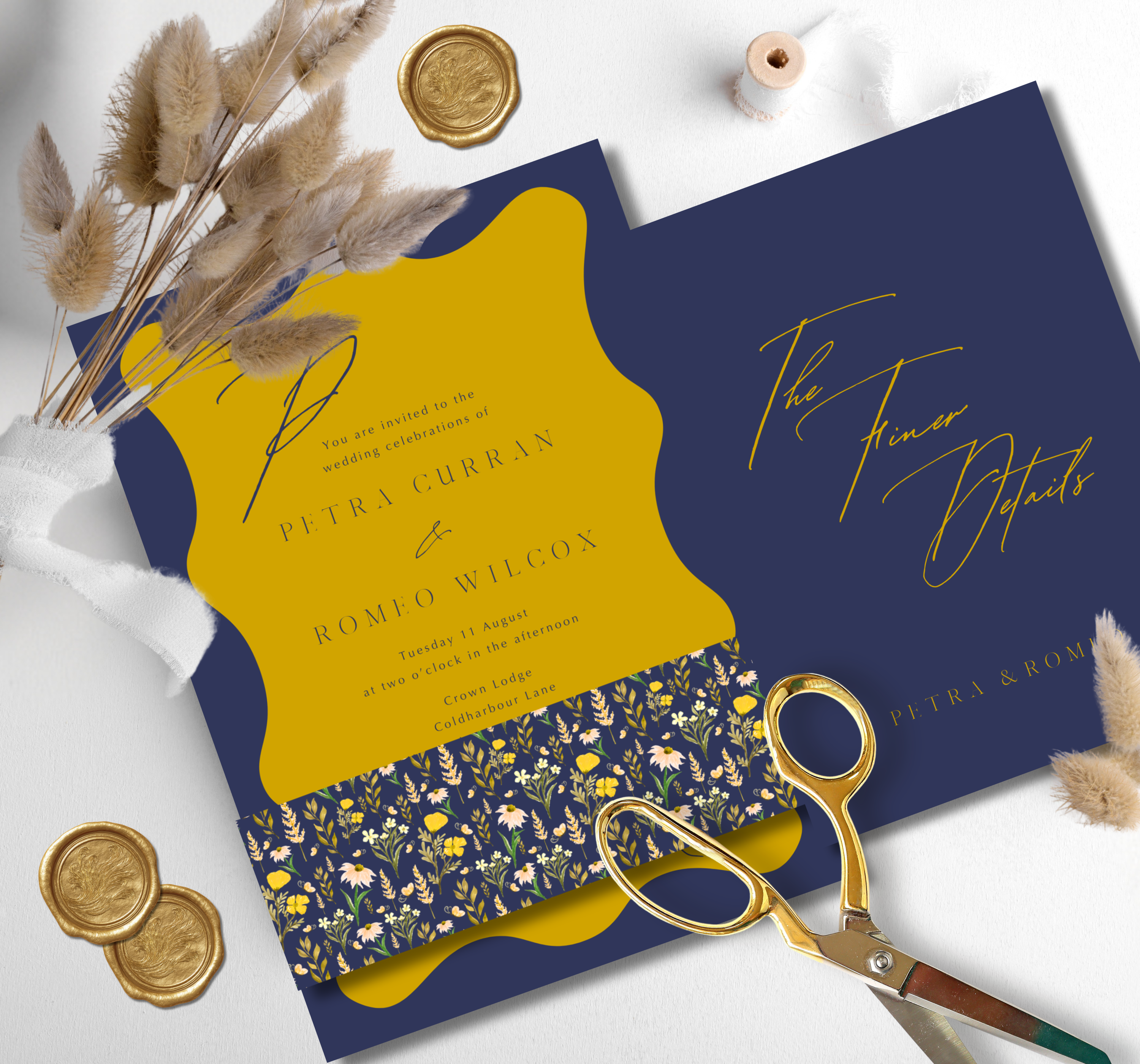 Yellow and blue wedding invitation suite with mustard and navy floral details