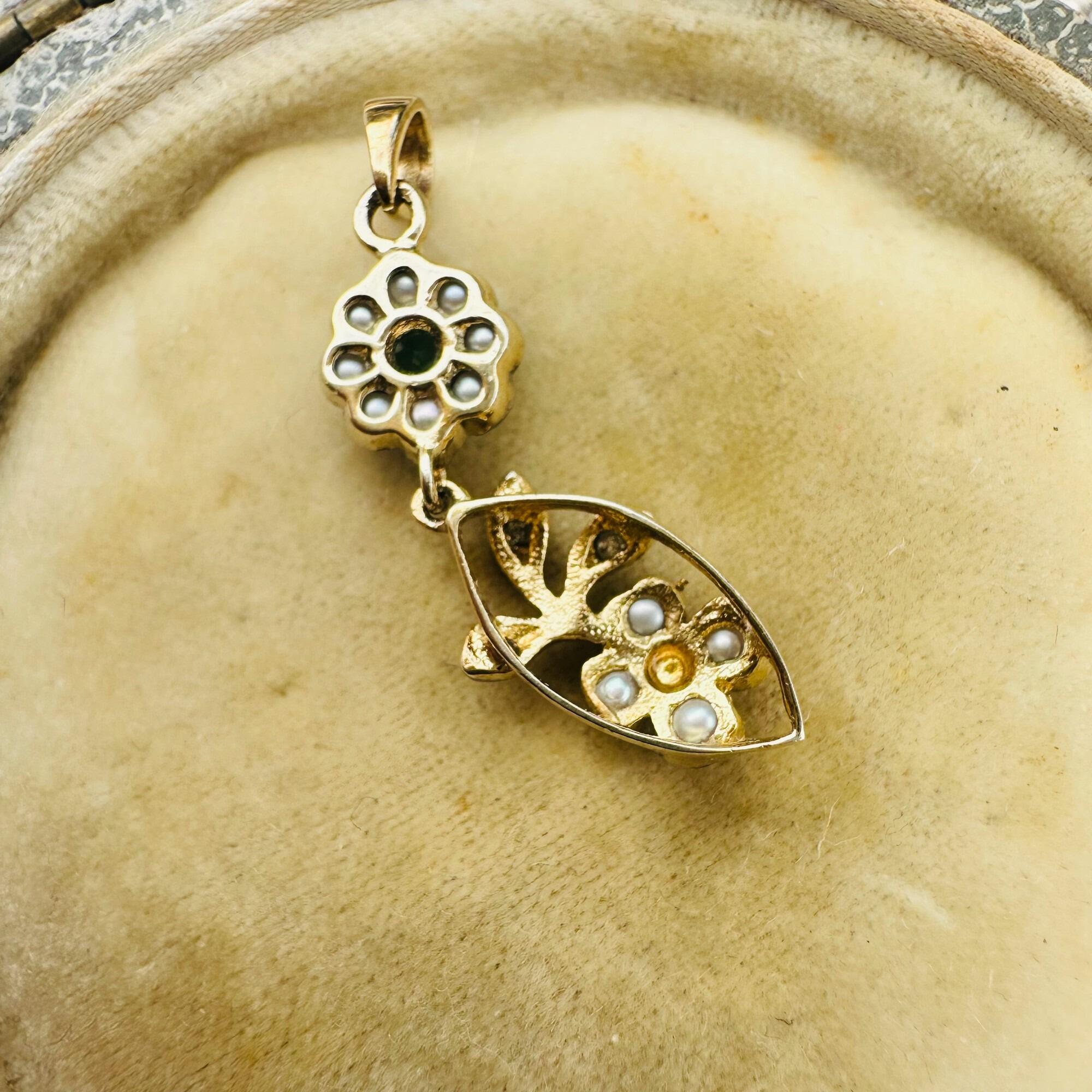 close up, Edwardian Style Emerald, Pearl & Diamond Pendant in Silver & 9k Gold displayed in antique box.