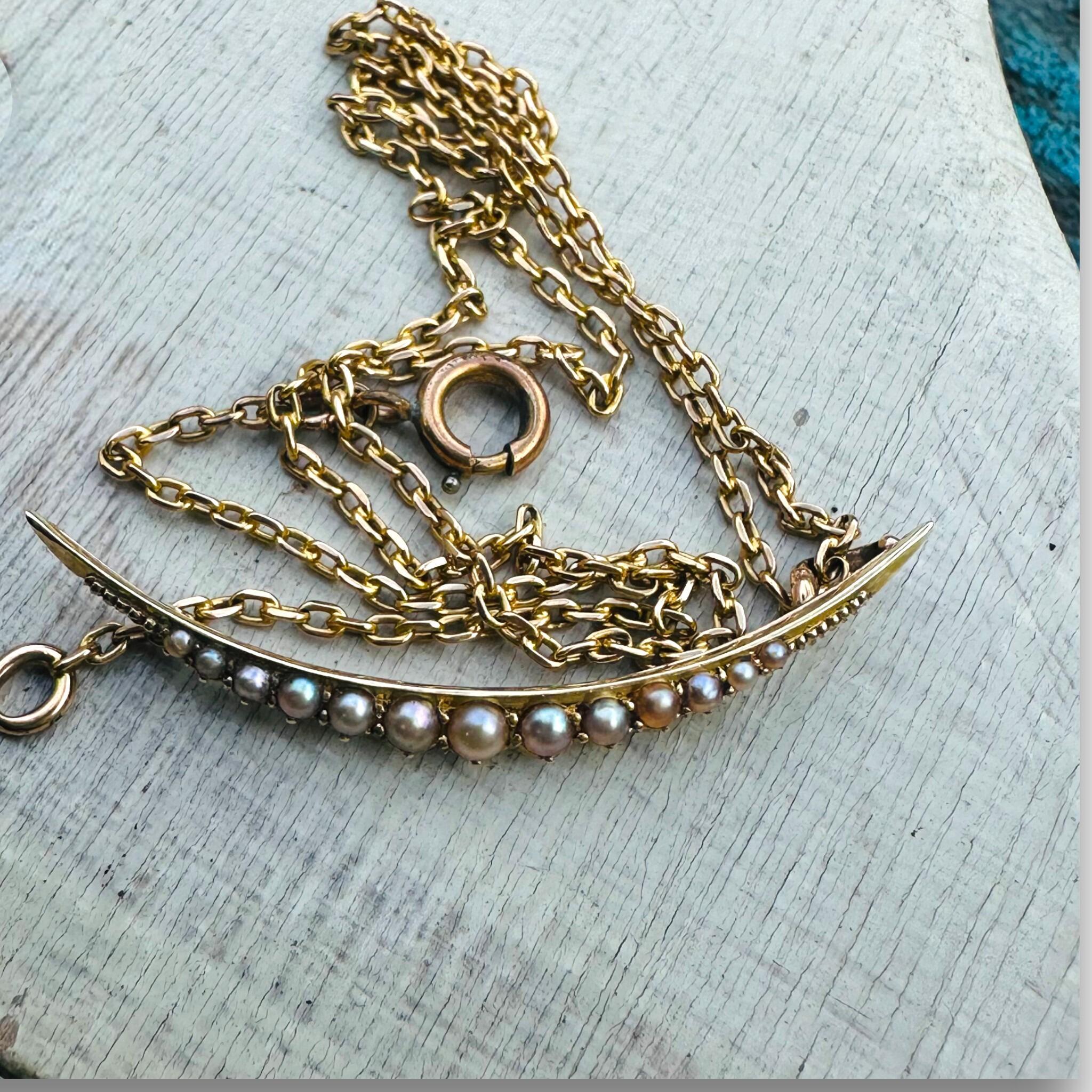 Antique 15ct gold crescent moon pendant set with seed pearls, Victorian era.