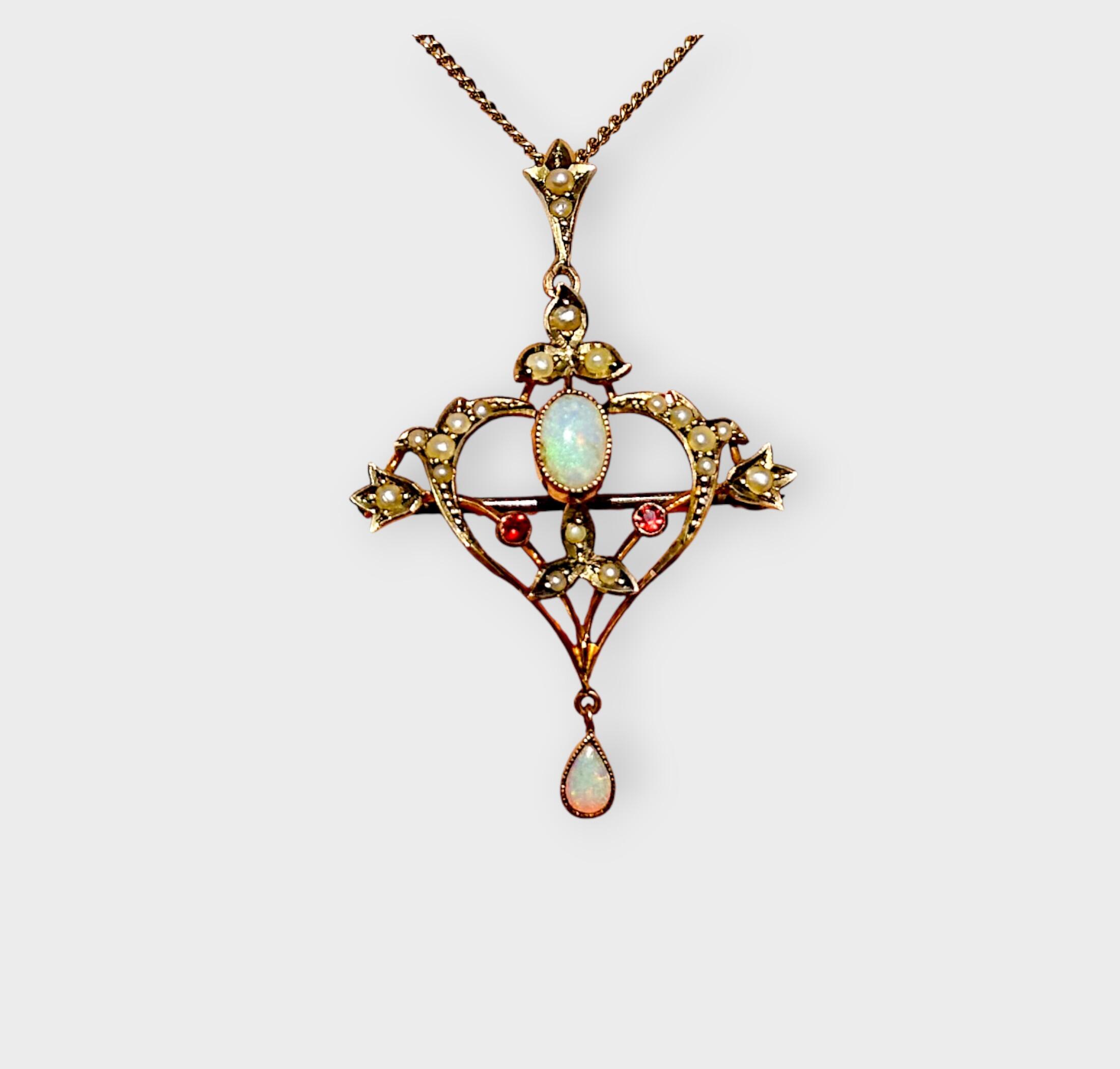 Art Nouveau 9k gold pendant brooch with opals, rubies, and pearls