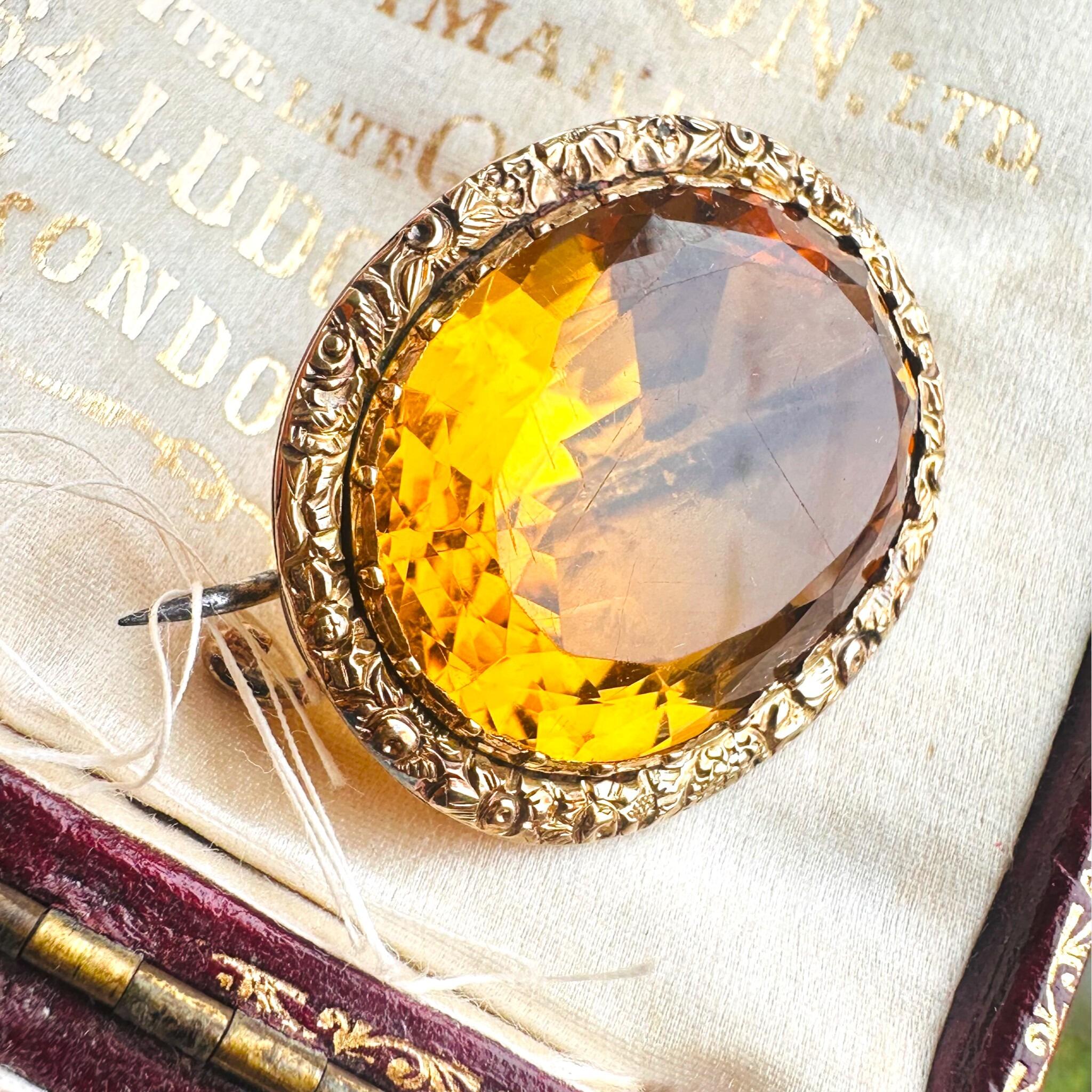 Side view of 15k Gold large Citrine Brooch, displayed in the antique box.