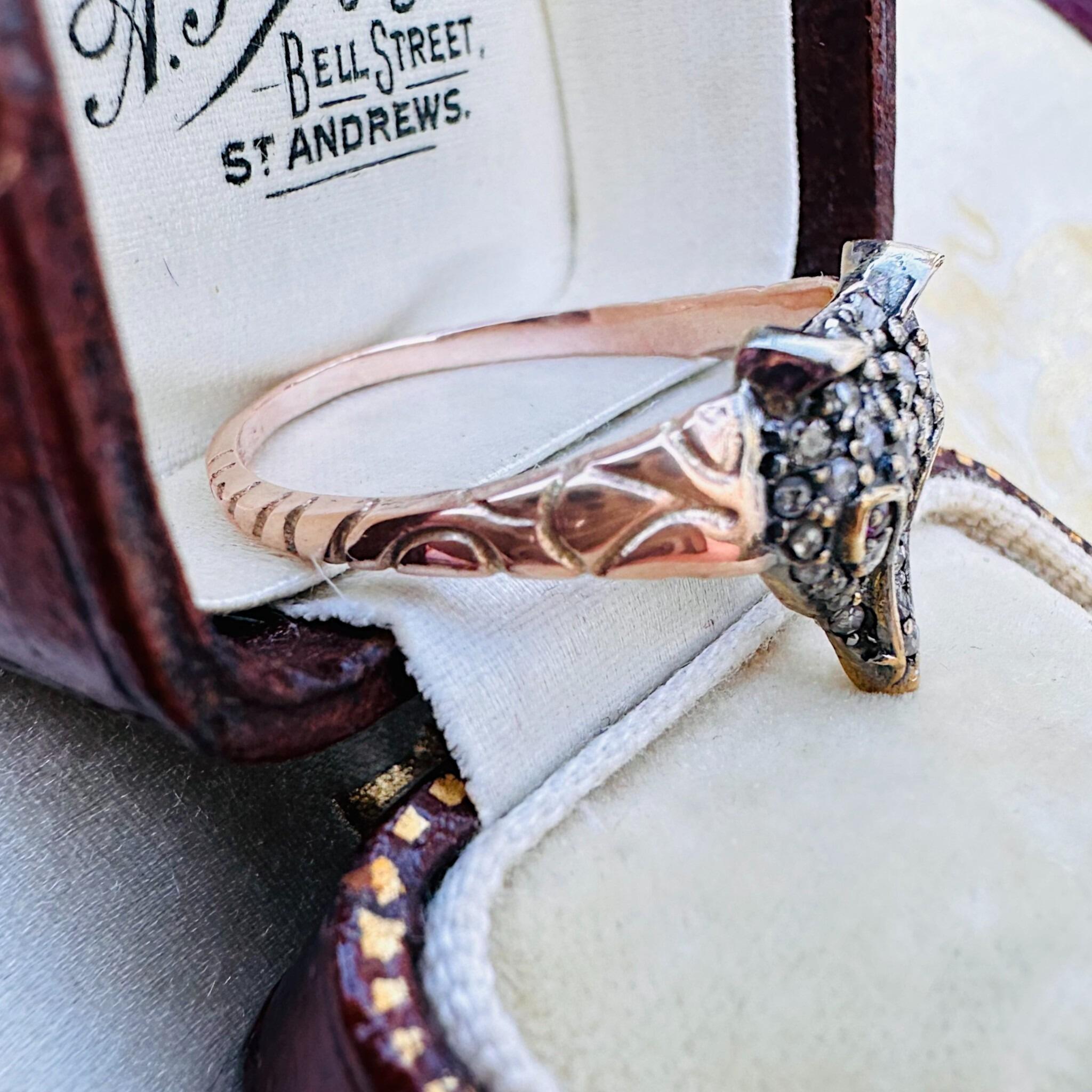 Side view of Rose Gold, Silver & Diamond & Ruby Eyed Fox Ring displayed in antique box