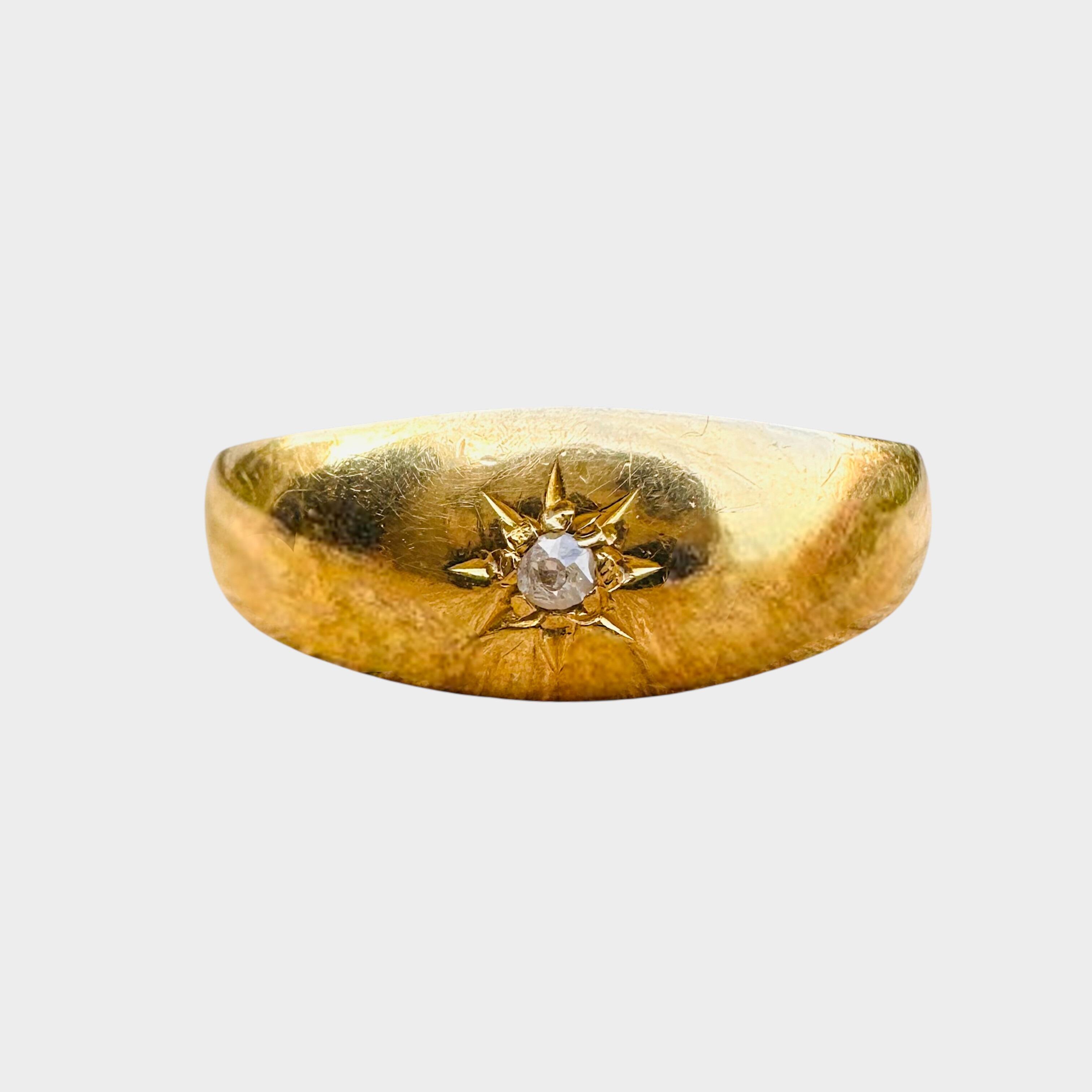 18ct Gold & Diamond Star Set Gypsy Ring grey background.