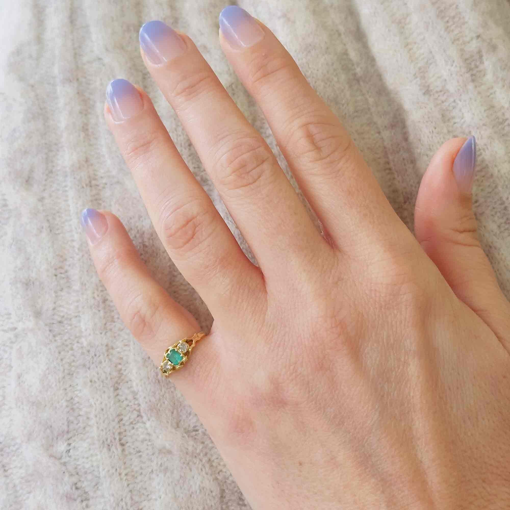Emerald & Diamond Three Stone Victorian Ring displayed on models hand