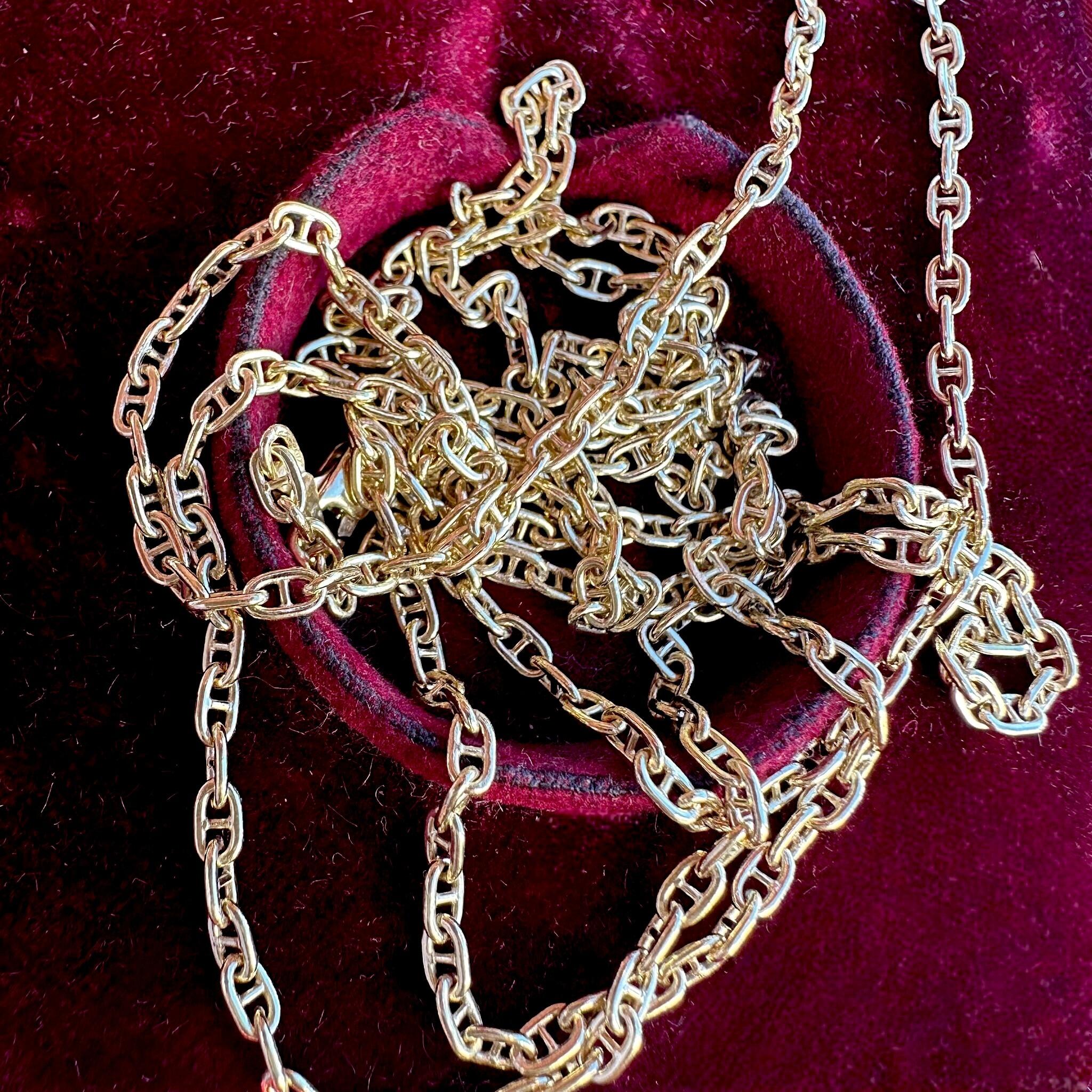 Gold Mariner Anchor Link Chain Necklace displayed laying in red velvet antique box