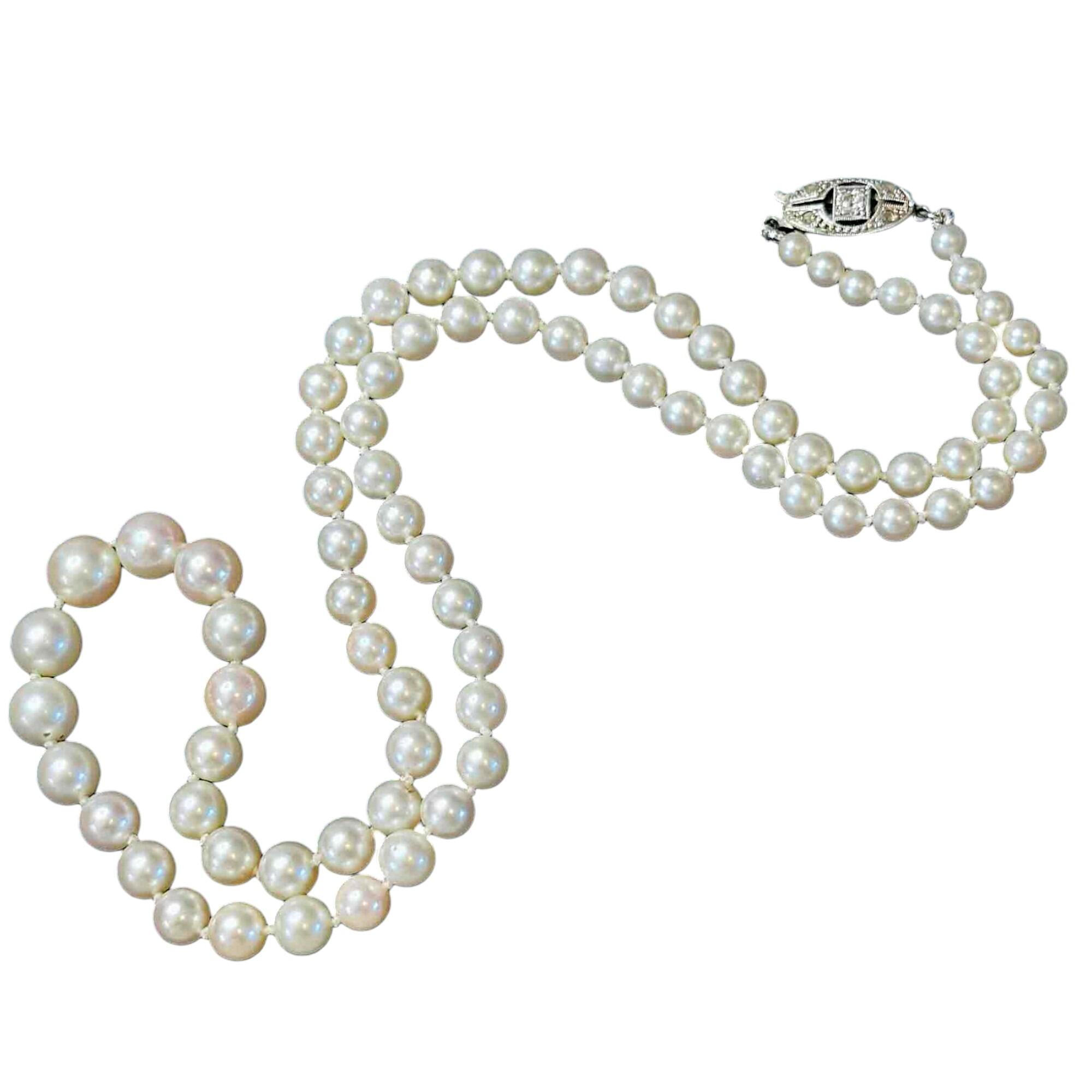 14ct White Gold & Diamond Saltwater Cultured Pearl Necklace with white background