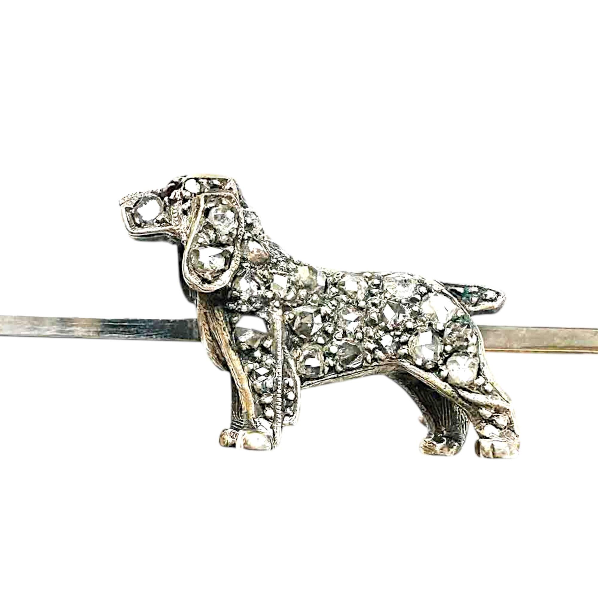Elegant hound dog brooch with pave-set diamonds, ruby eye, silver bar, rose gold pin