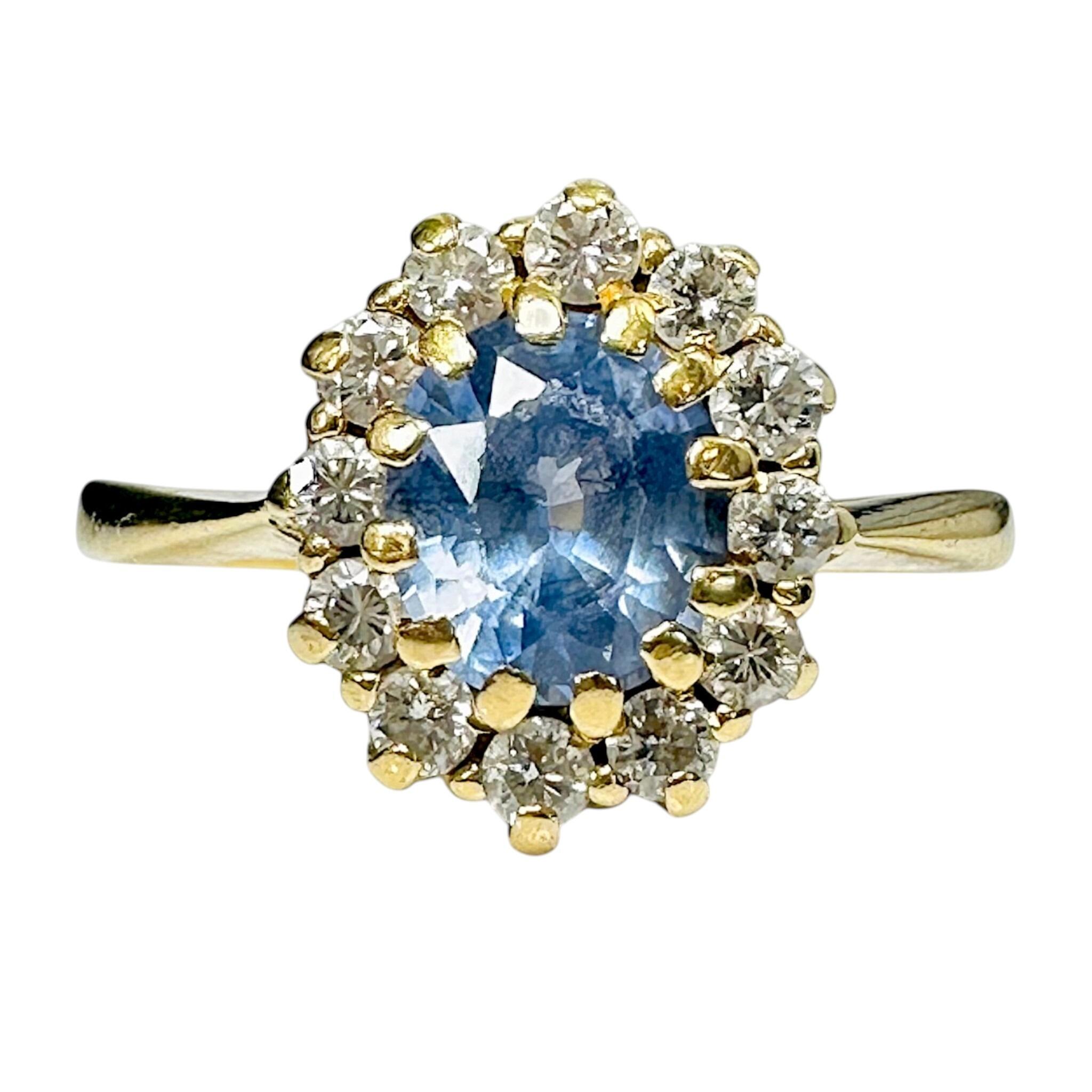 front view of Vintage 18k Gold Cornflower Blue Sapphire & Diamond Cluster Ring with white background